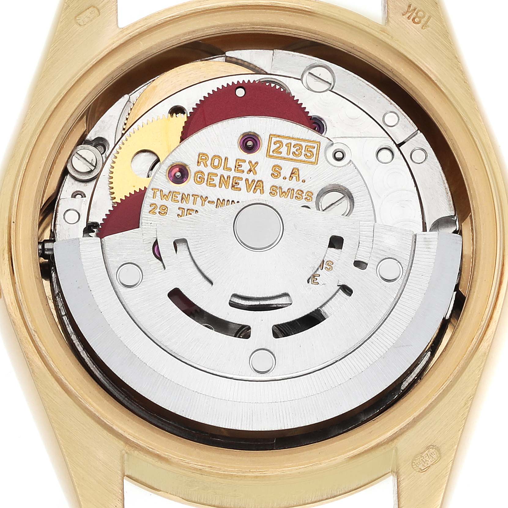 The image shows the movement of a Rolex President 69178 Women's Yellow Gold Blue Dial watch viewed from the back, highlighting its intricate mechanical components.