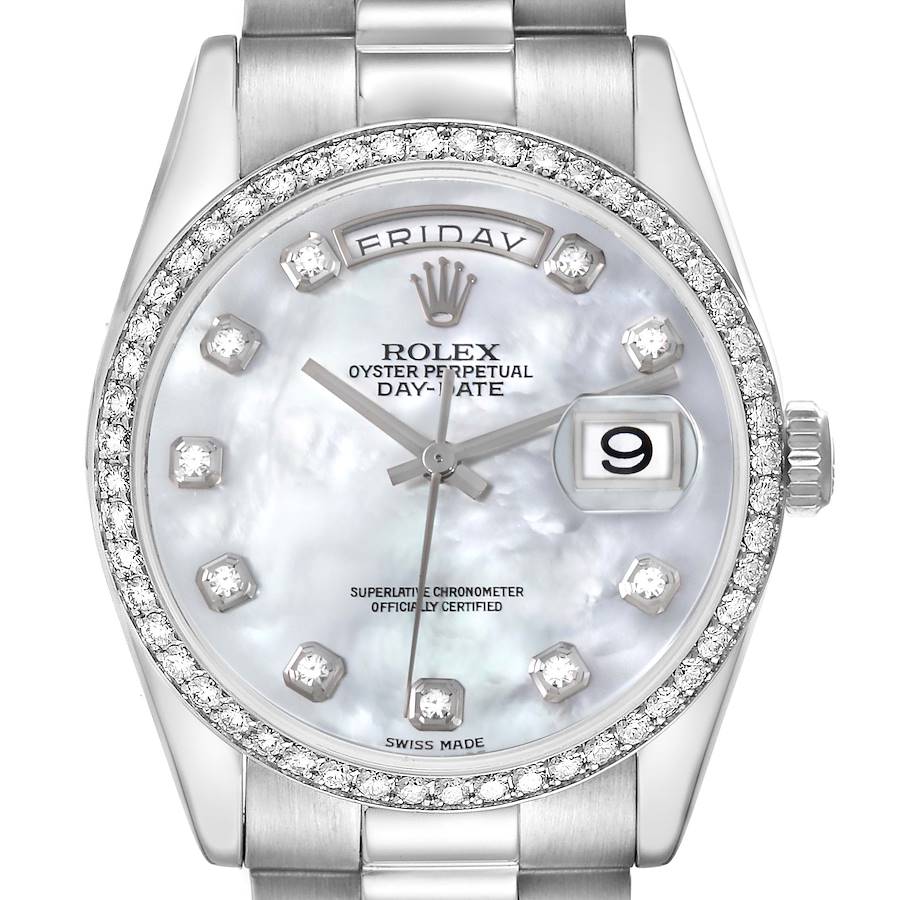 The Rolex President watch is shown from the front, displaying the dial, bezel, and part of the bracelet.