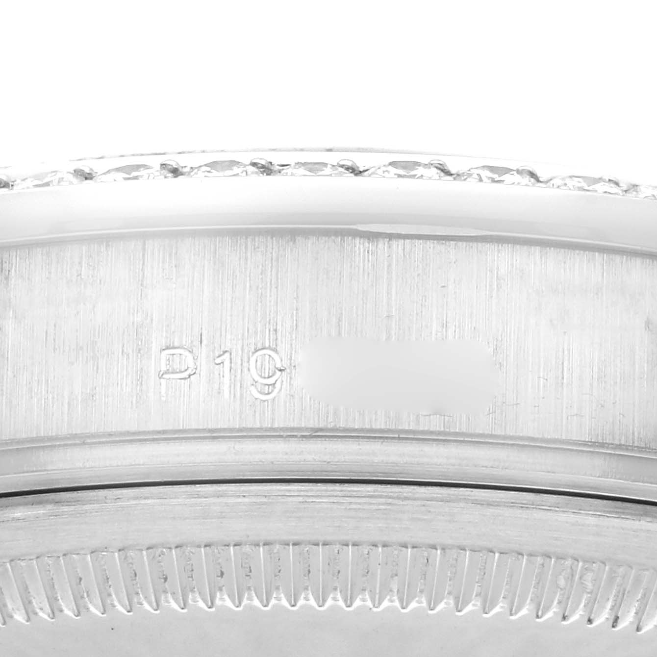 The image shows a close-up side view of the Rolex President 118346 Men's Platinum Mother of Pearl Dial 118346 Men's Platinum Mother of Pearl Dial model case edge with visible engravings.