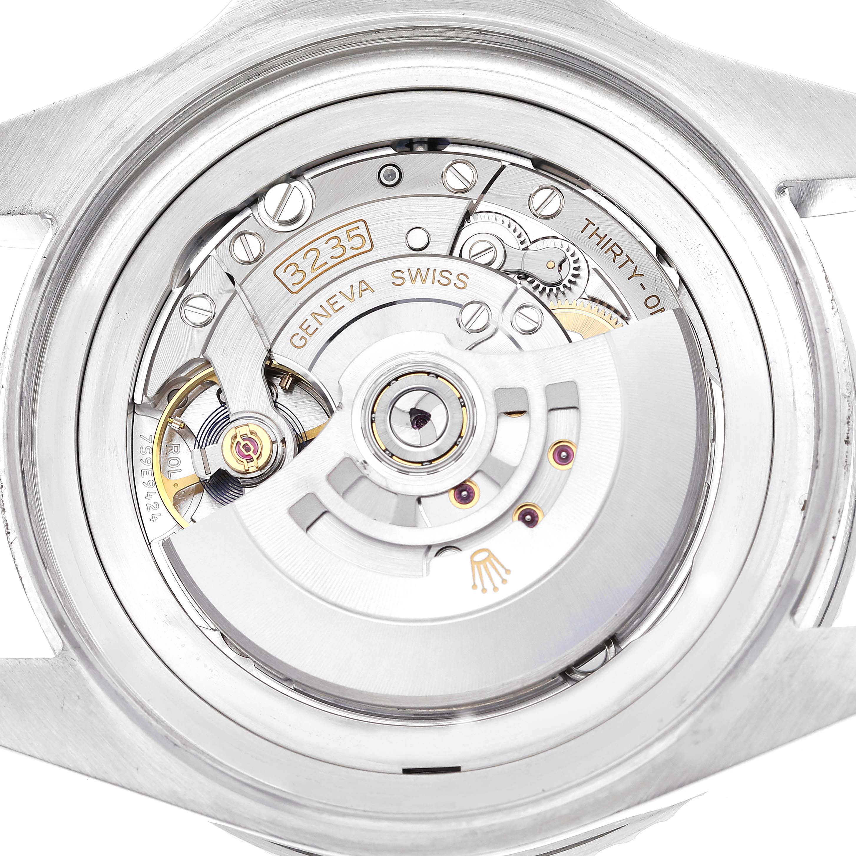 The image shows the open case back view of a Rolex Sea-Dweller 126660 Men's Stainless Steel Blue Dial 126660 Men's Stainless Steel Blue Dial, revealing its intricate mechanical movement.