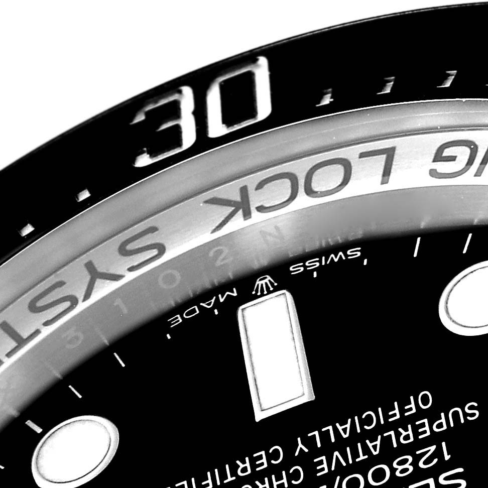 The image shows a close-up angle of the Rolex Sea-Dweller 126660 Men's Stainless Steel Blue Dial 126660 Men's Stainless Steel Blue Dial watch's bezel, part of the dial, and text details including the "Ring Lock System."