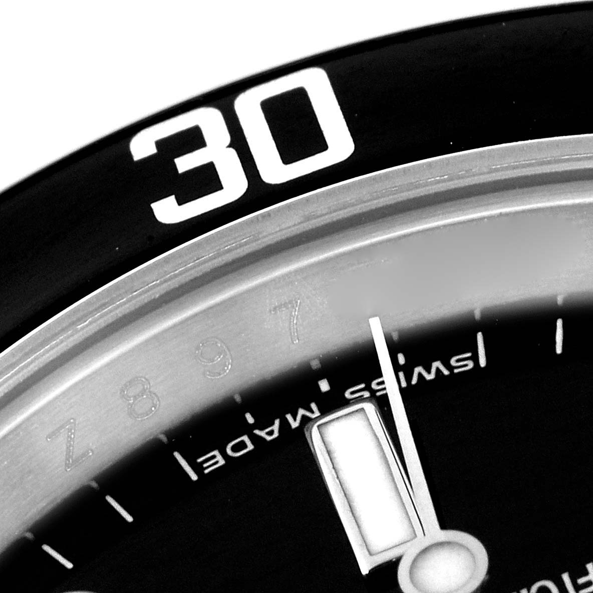 The image shows a close-up of the bezel and portion of the dial of the Rolex Submariner 14060M Men's Stainless Steel Black Dial 14060M Men's Stainless Steel Black Dial, with part of the number 30 visible.