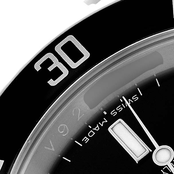 The image shows a close-up of the bezel and dial of a Rolex Submariner 16610 Men's Stainless Steel Black Dial, highlighting the "30" mark and "Swiss Made" text.