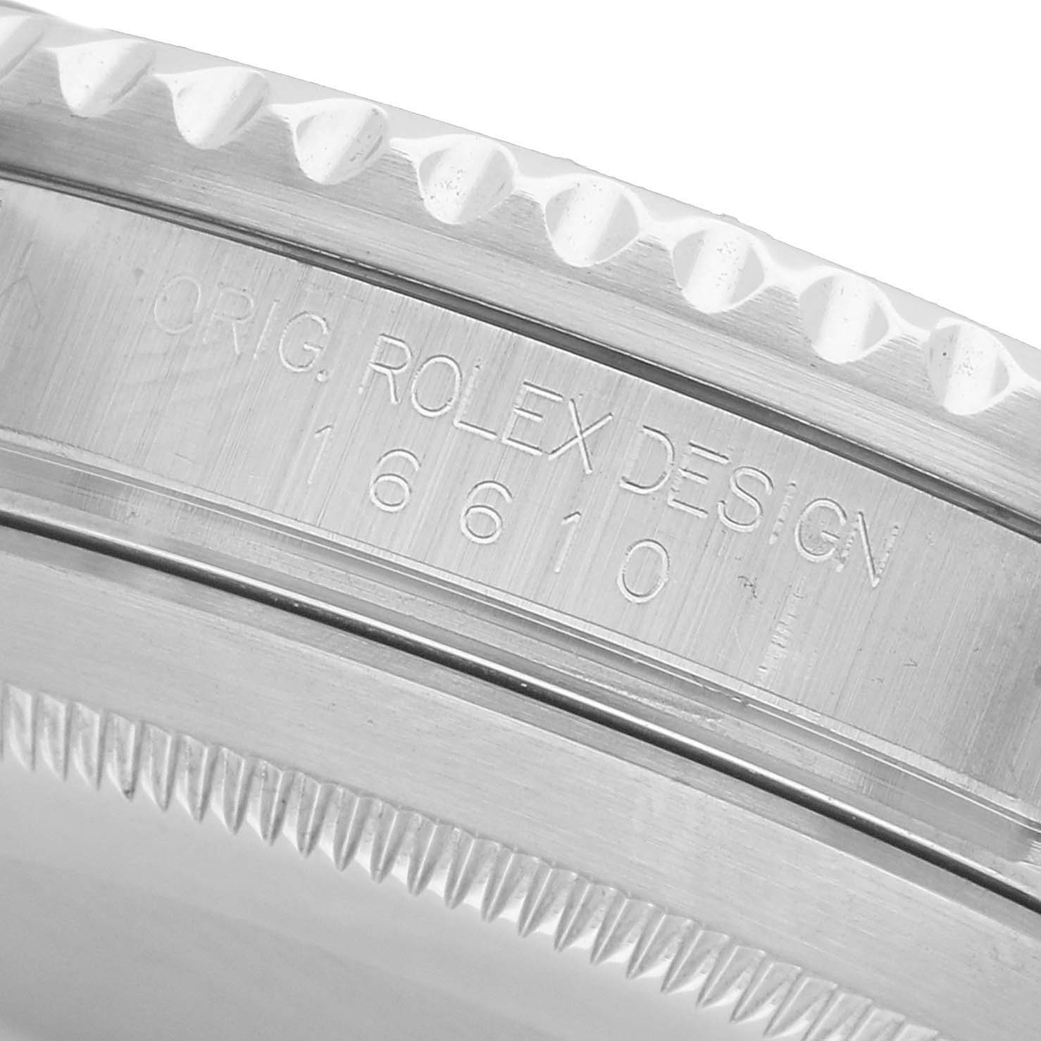 The image shows an angled close-up of the Rolex Submariner 16610 Men's Stainless Steel Black Dial's case edge and model engraving.