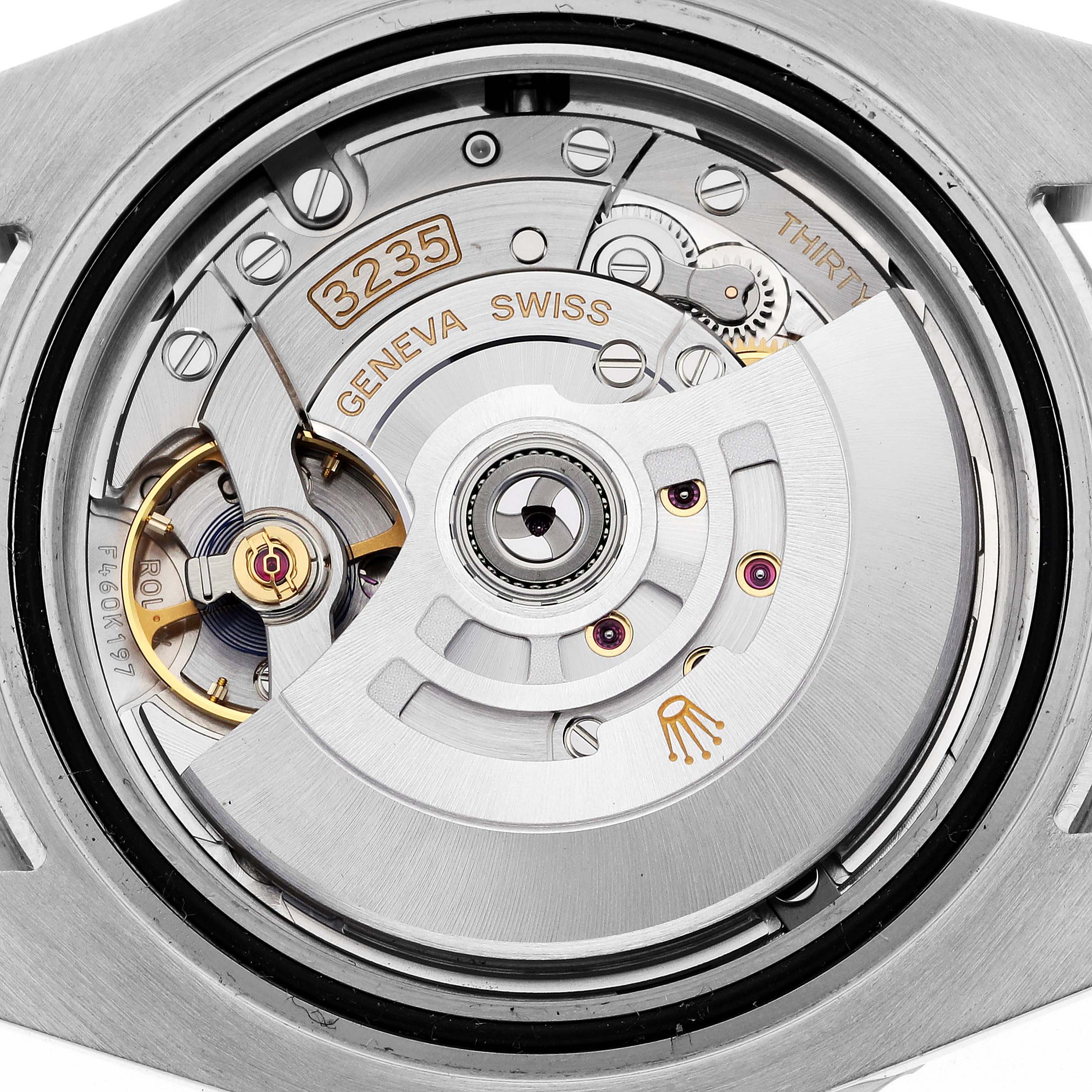 The image shows the movement of a Rolex Submariner 126610LV Men's Stainless Steel Black Dial 126610LV Men's Stainless Steel Black Dial, seen from the back, highlighting the intricate mechanics.