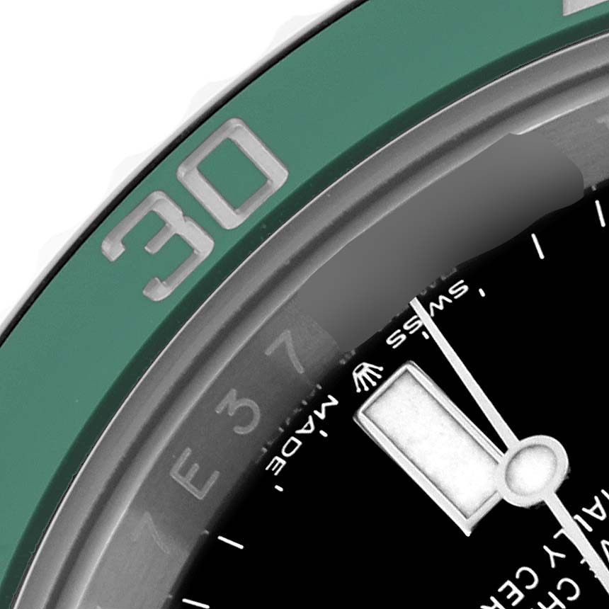 The image shows a close-up of the bezel and part of the dial of a Rolex Submariner 126610LV Men's Stainless Steel Black Dial 126610LV Men's Stainless Steel Black Dial watch.