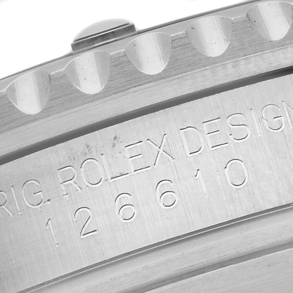 The image shows a close-up of the side engraving on a Rolex Submariner 126610LV Men's Stainless Steel Black Dial 126610LV Men's Stainless Steel Black Dial watch bezel.