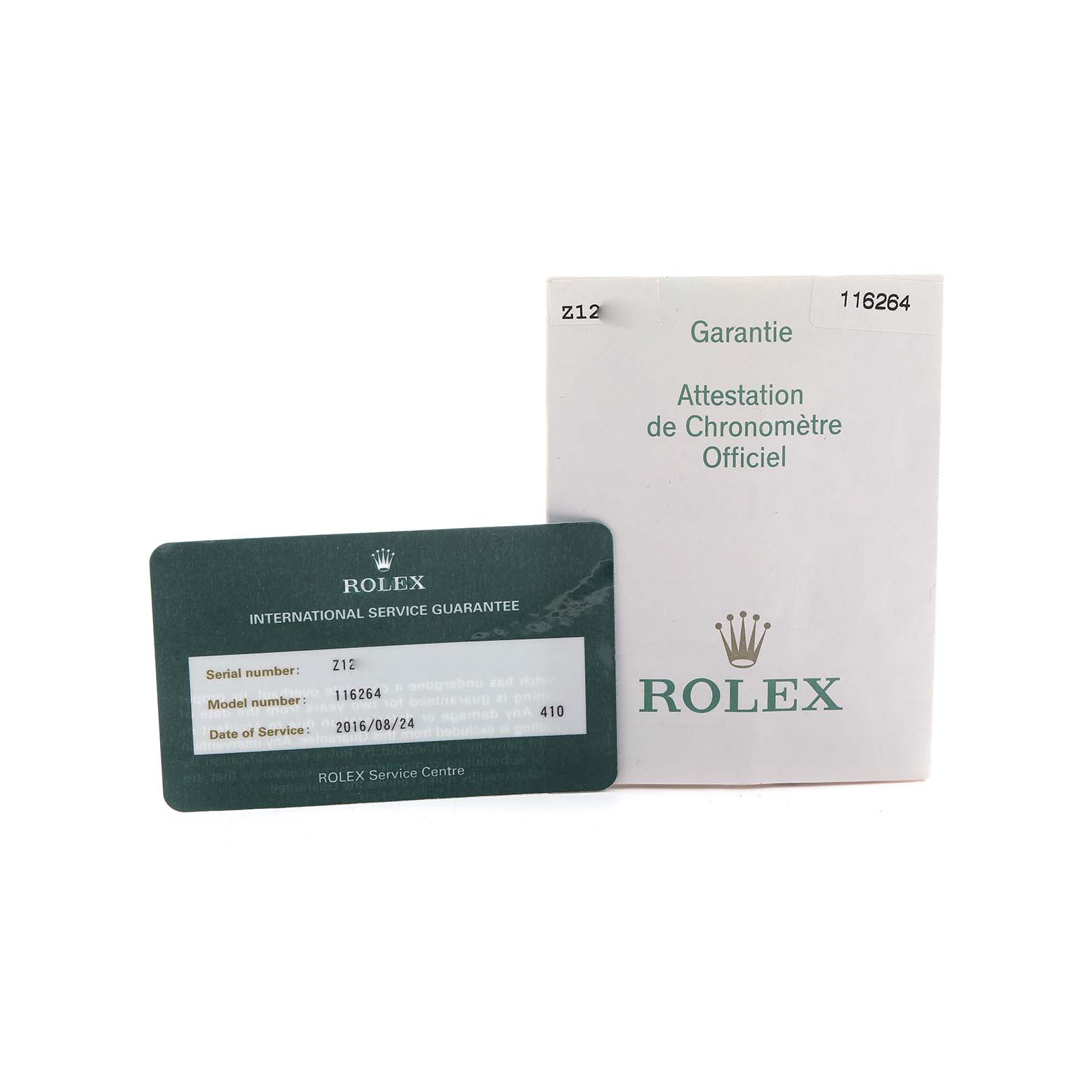 The image shows a warranty card and booklet for a Rolex Turn-o-Graph 116264 Men's Stainless Steel Black Dial, displaying model and serial details.