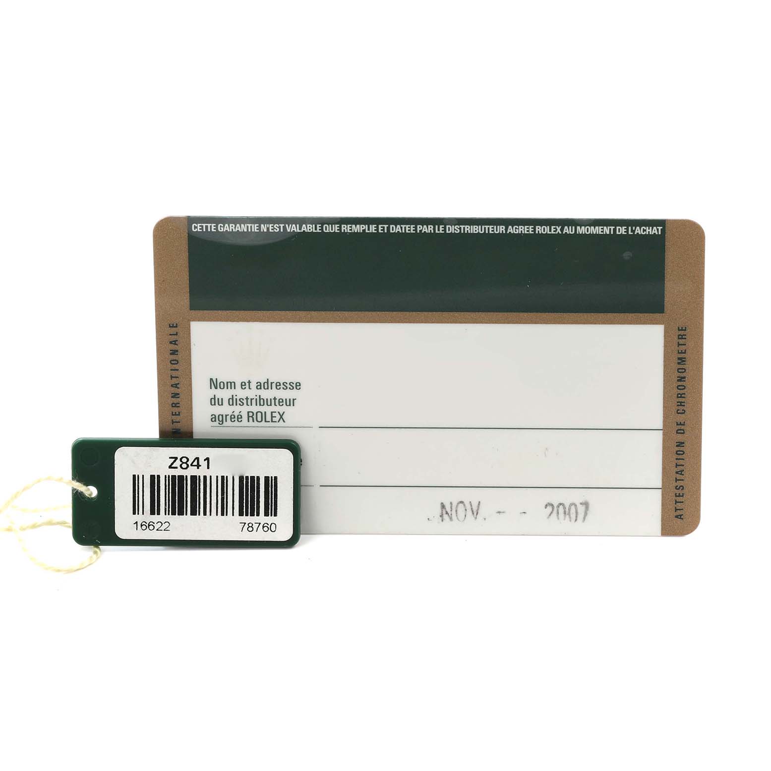 The image shows a warranty card and tag for the Rolex Yacht-Master 16622 Men's Steel and Gold (two tone) Silver Dial 16622 Men's Steel and Gold (two tone) Silver Dial watch, displaying the model and serial number.