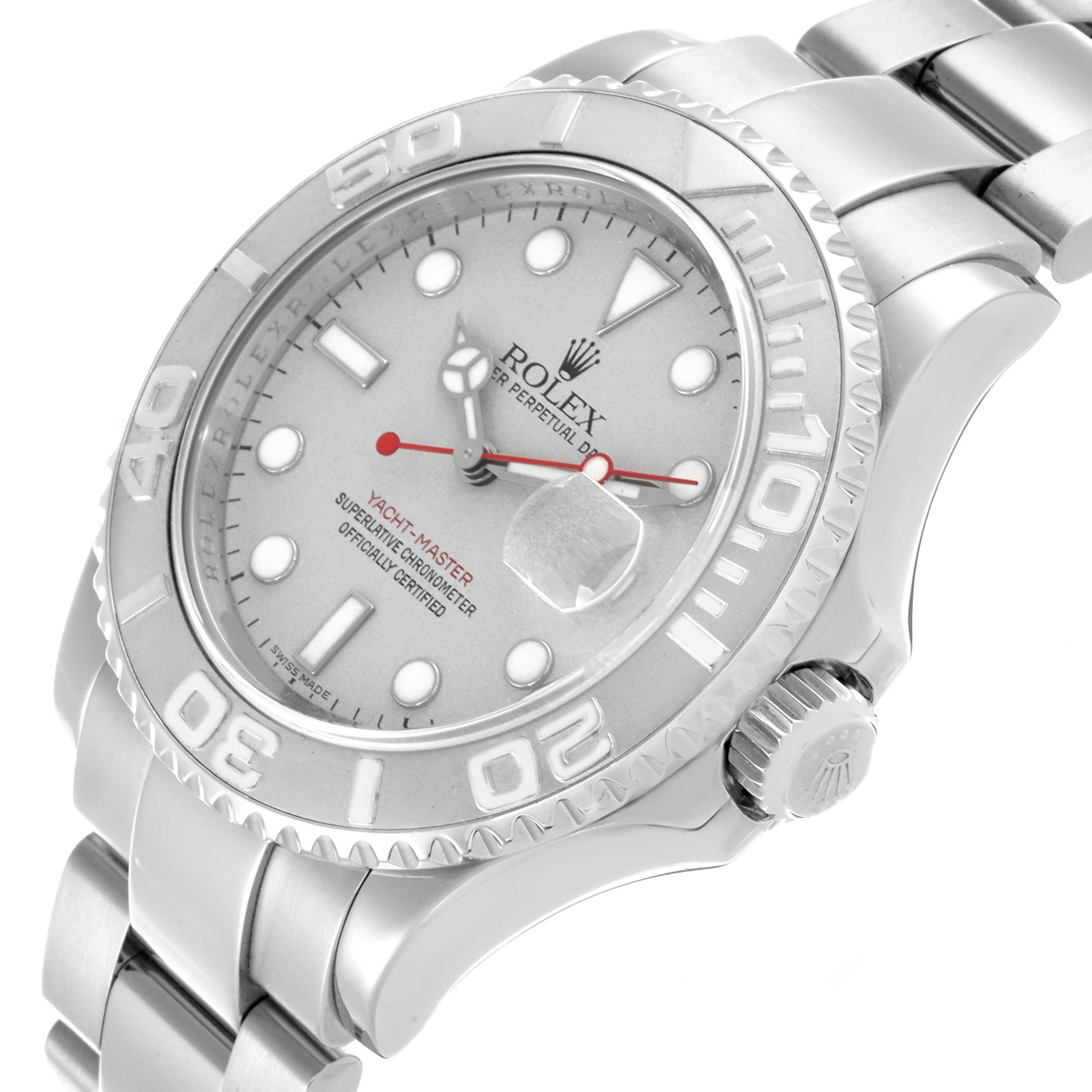 The Rolex Yacht-Master 16622 Men's Steel and Gold (two tone) Silver Dial 16622 Men's Steel and Gold (two tone) Silver Dial watch is shown from an angled top view, displaying its face, bezel, and part of the bracelet.