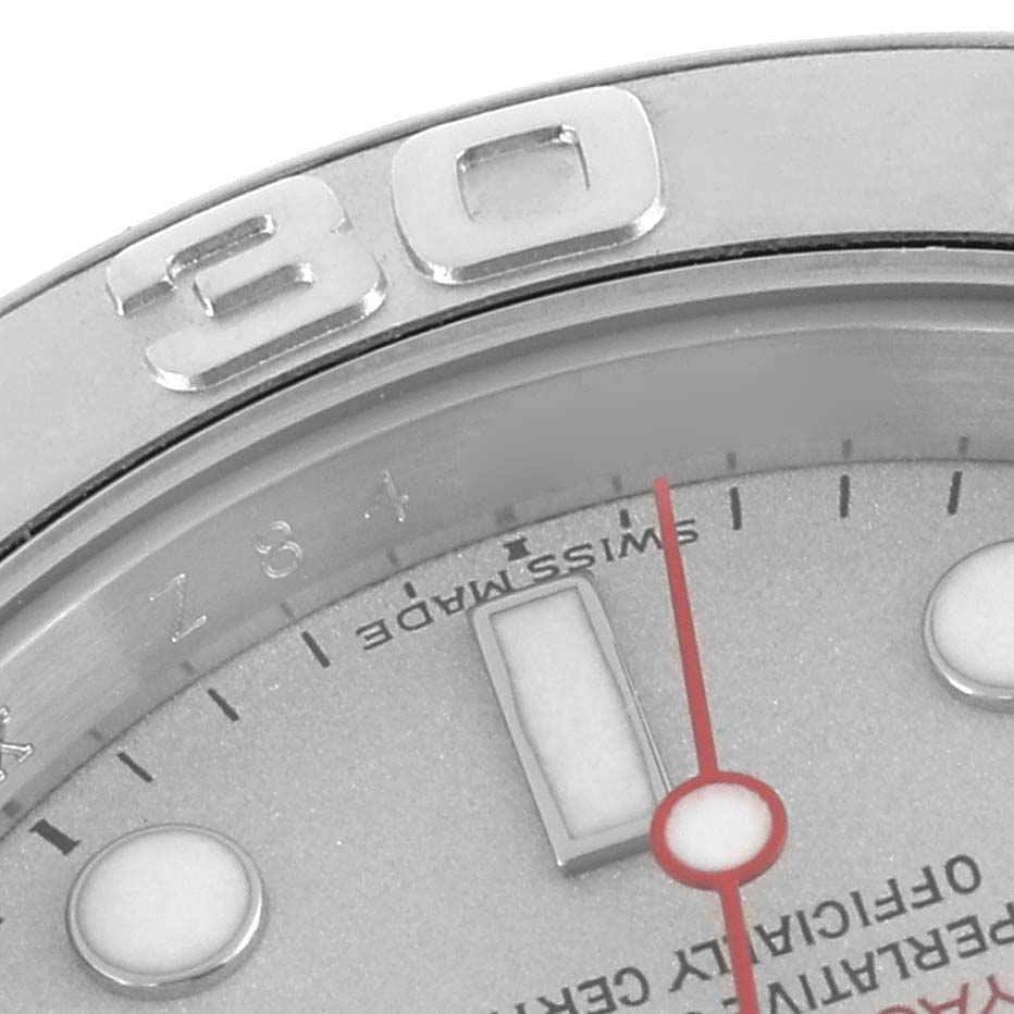 This Rolex Yacht-Master 16622 Men's Steel and Gold (two tone) Silver Dial 16622 Men's Steel and Gold (two tone) Silver Dial image shows a close-up of the bezel with the number "30" and part of the watch face and hands.