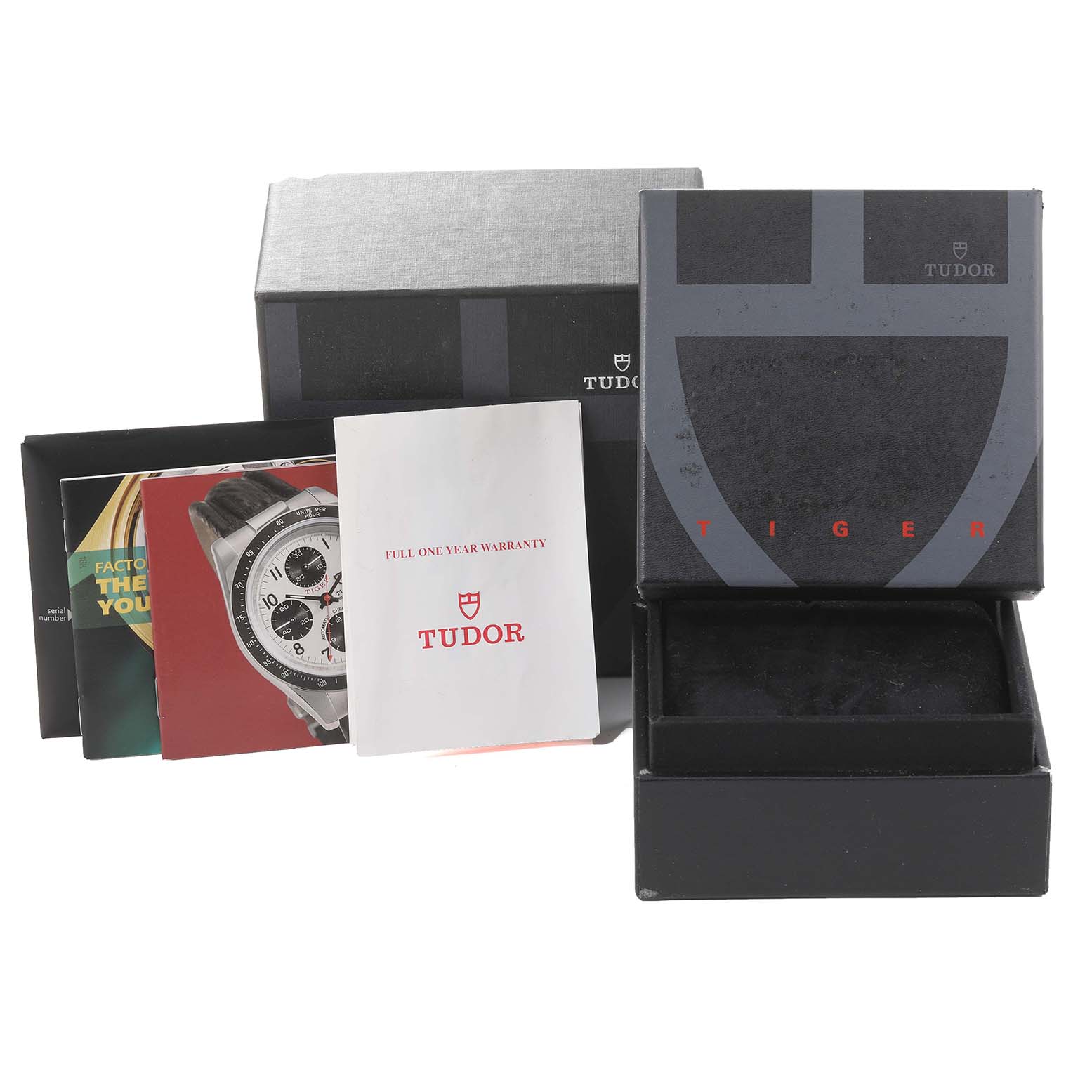 This image shows the packaging, manuals, and warranty card for a Tudor Tiger 79263 Men's Steel and Gold (two tone) White Dial 79263 Men's Steel and Gold (two tone) White Dial model watch.