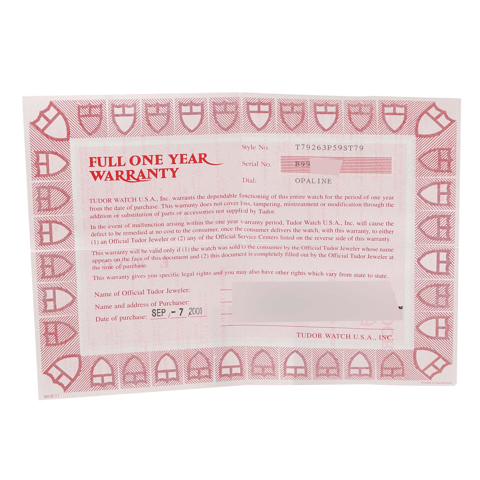 This image shows a Tudor warranty card for the Tiger model watch, displaying warranty details and purchase information.