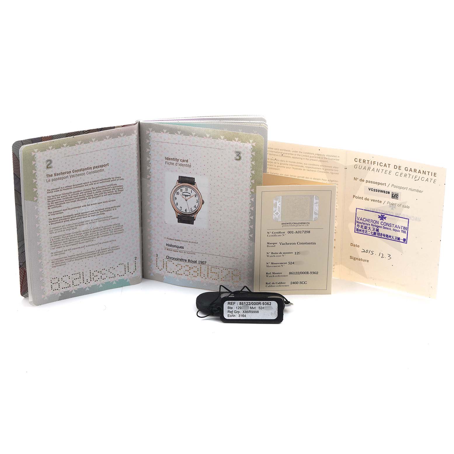 The image shows documents and a tag for the Vacheron Constantin Historiques 86122/000R-9362 Men's Rose Gold White Dial model, including a passport, warranty, and reference tag.