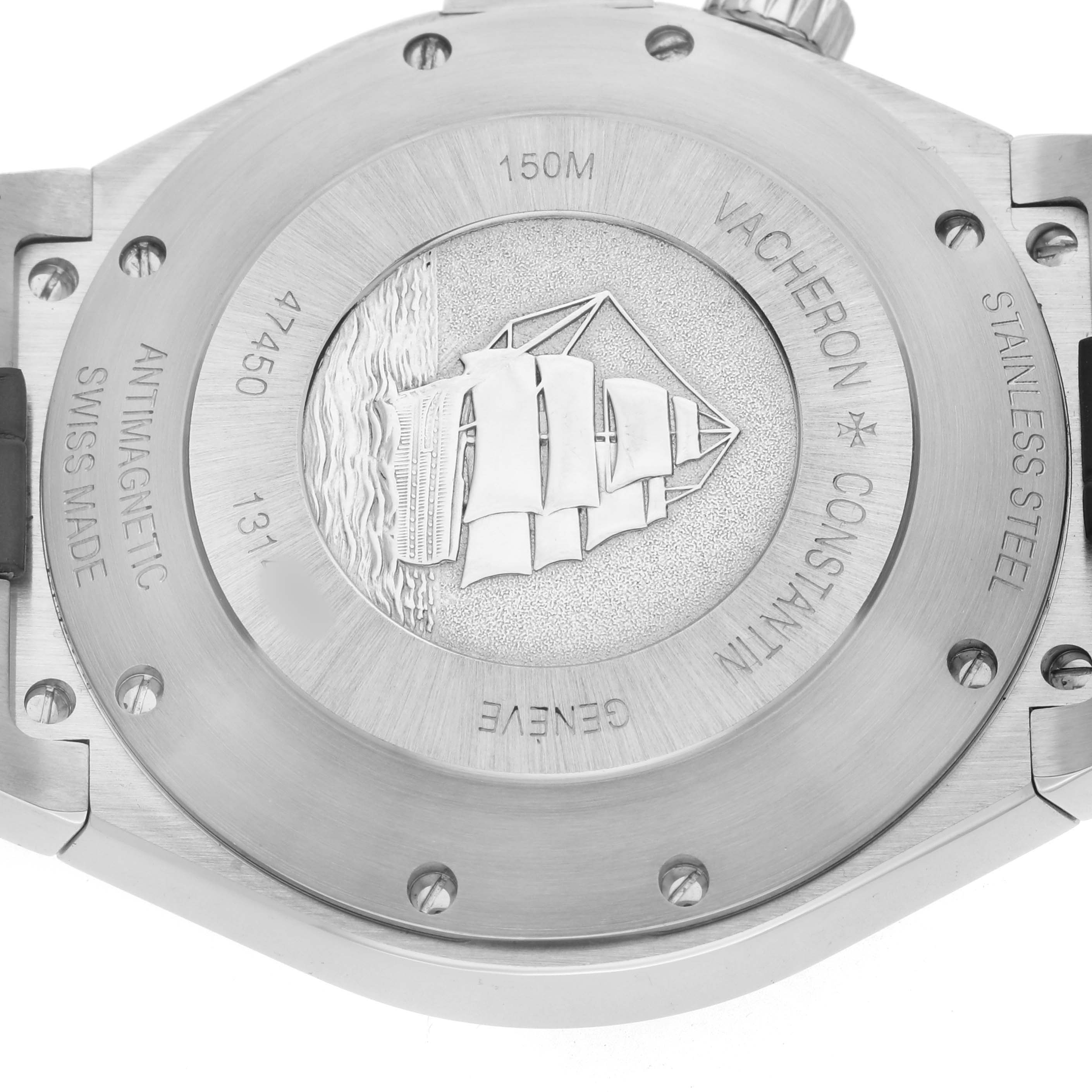 The image shows the case back of a Vacheron Constantin Overseas 47450 Men's Stainless Steel Blue Dial watch, featuring an engraved ship motif.