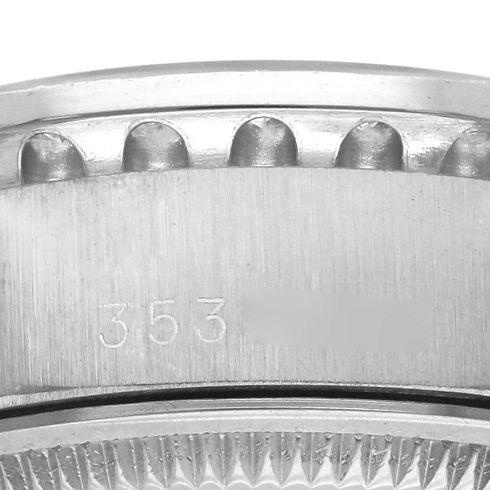 The image shows a close-up of the side edge of a Rolex President 6913 Women's White Gold Blue Dial 6913 Women's White Gold Blue Dial model, highlighting the bezel and edge details.