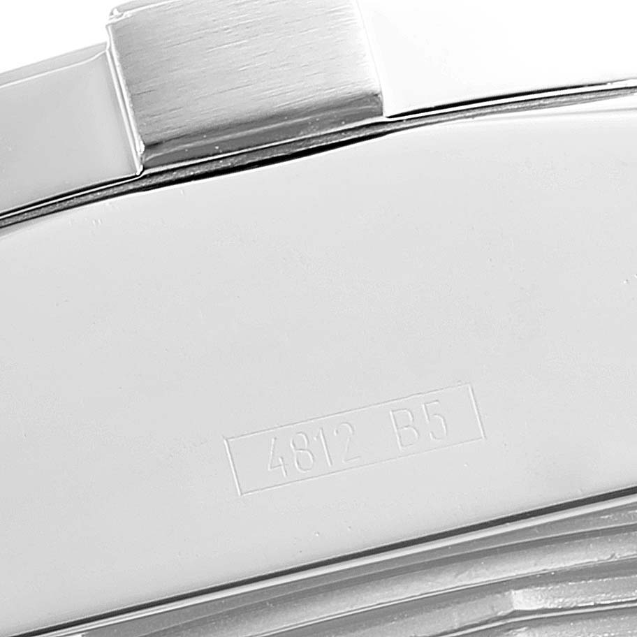 The image shows a close-up of the side and back case of a Breitling Avenger A13370 Men
s Stainless Steel Black Dial A13370 Men
s Stainless Steel Black Dial watch, with part of the serial number visible.