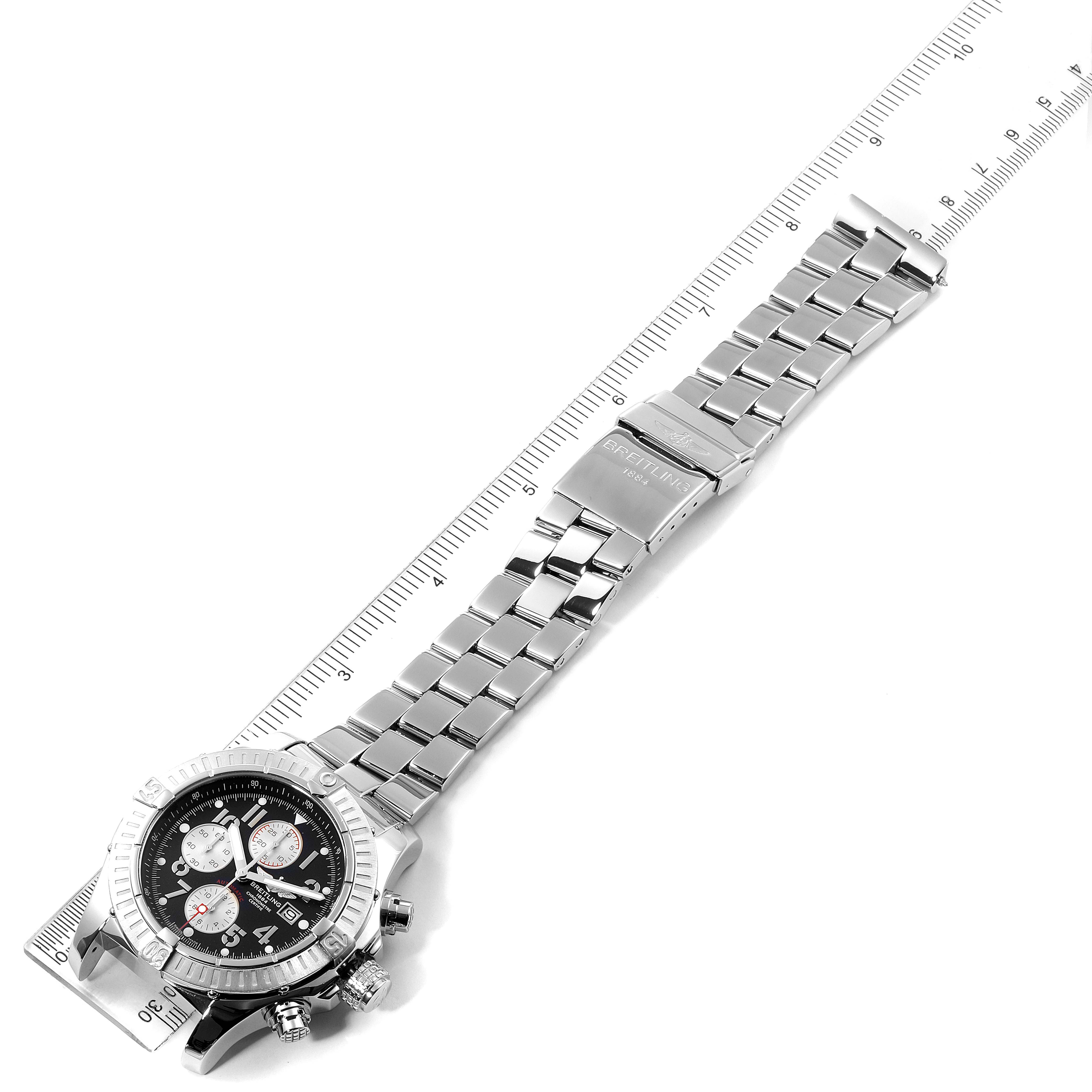 The image shows a Breitling Avenger A13370 Men
s Stainless Steel Black Dial A13370 Men
s Stainless Steel Black Dial watch from an angled top view, displaying its face, bezel, and full bracelet with clasp.