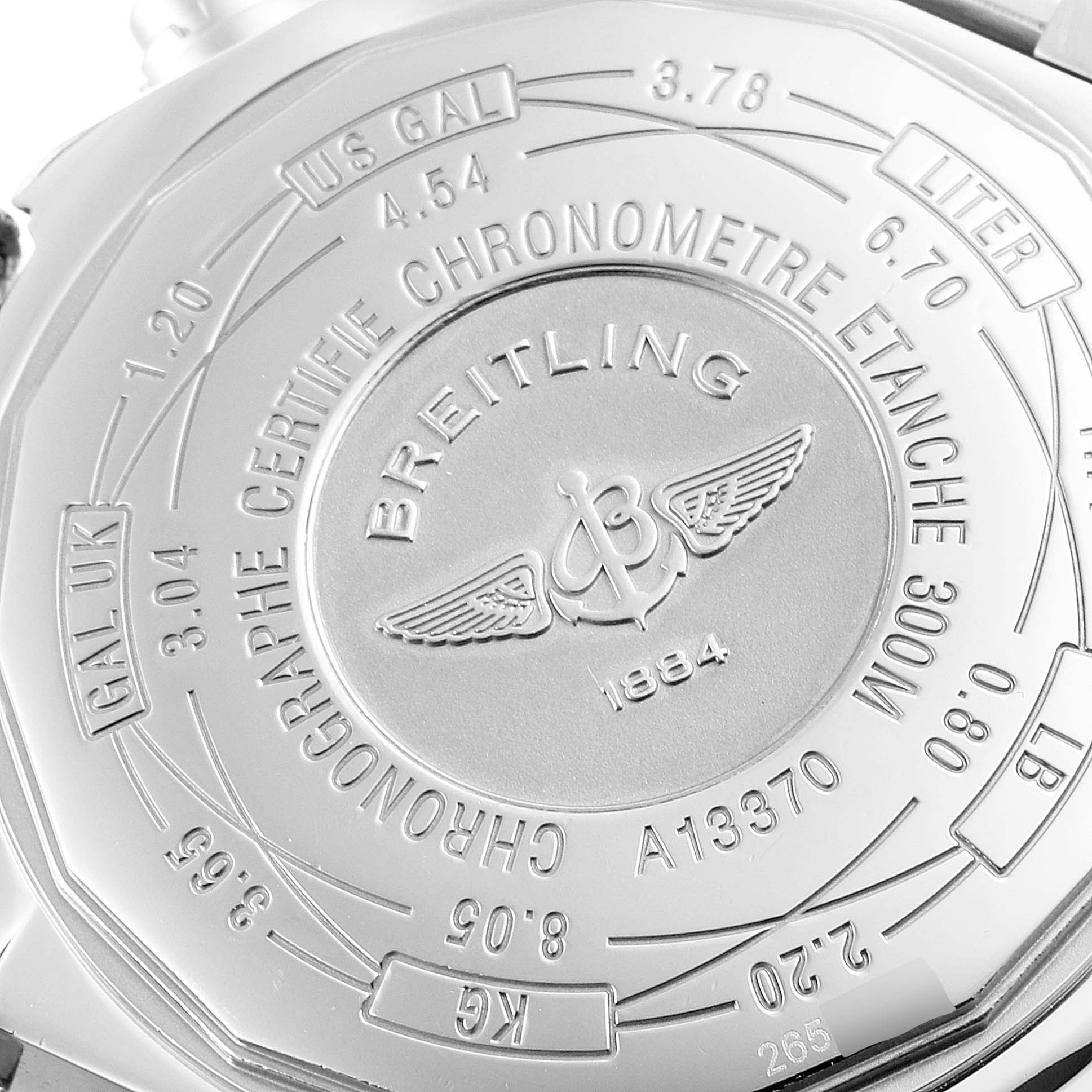 The image shows the back casing of a Breitling Avenger A13370 Men
s Stainless Steel Black Dial A13370 Men
s Stainless Steel Black Dial watch, highlighting its engravings and specifications.