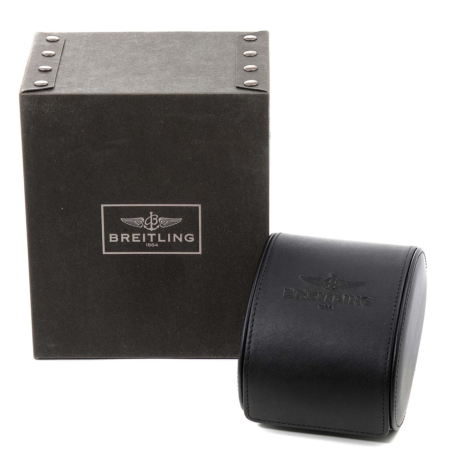 The image shows the packaging for a Breitling Superocean A17391 Men
s Stainless Steel Black Dial A17391 Men
s Stainless Steel Black Dial watch, including a box and a leather travel case, both branded with the Breitling logo.