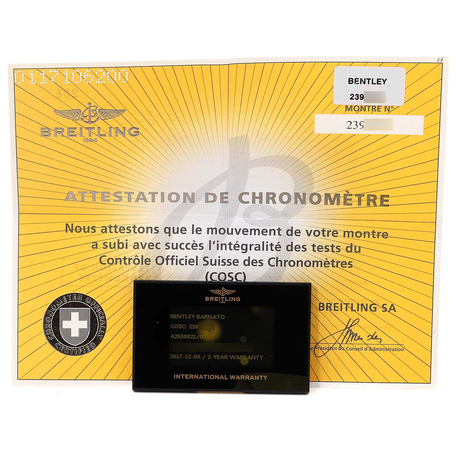 The image shows the warranty card and chronometer certification for a Bentley model by Breitling.