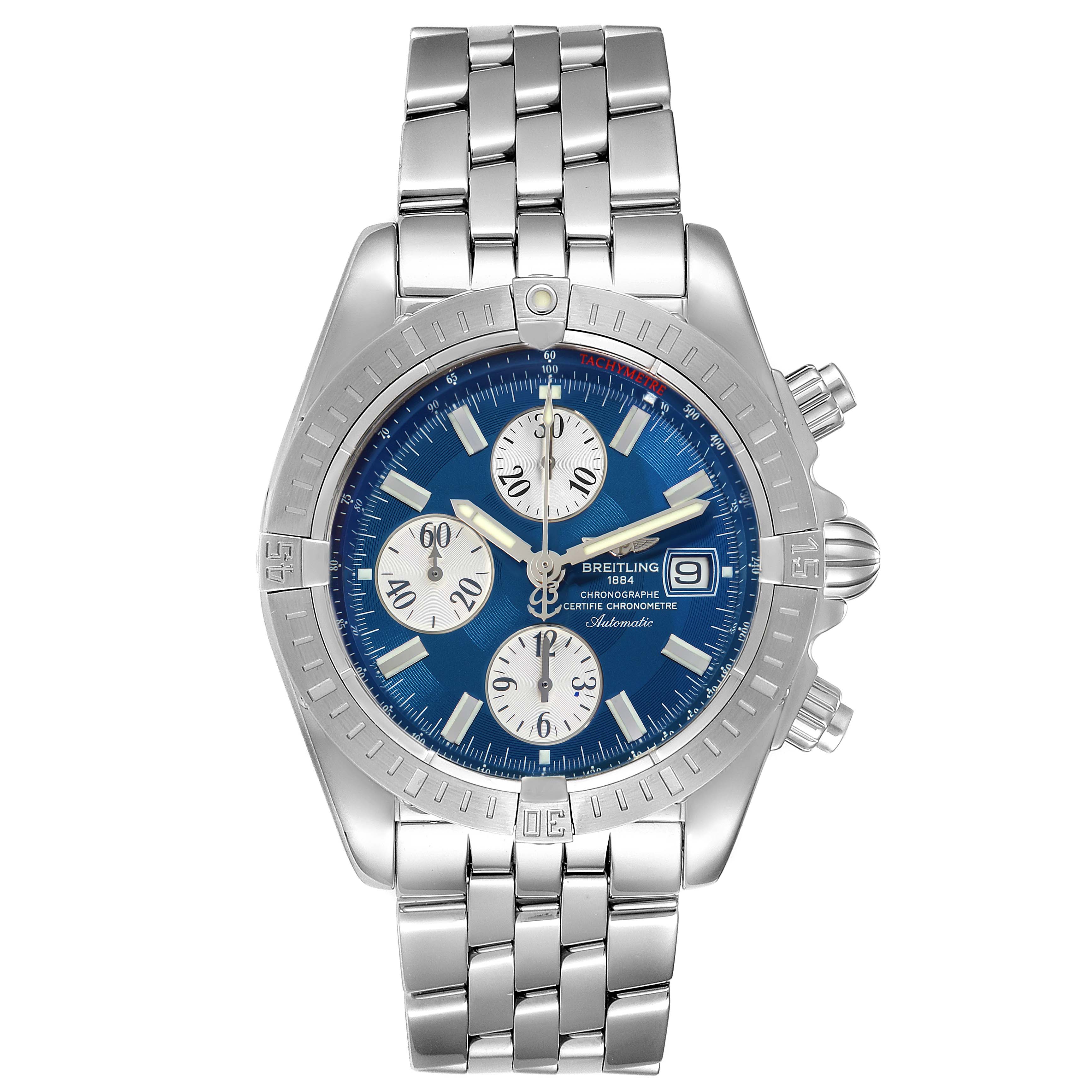 The Breitling Chronomat A13356 Men
s Stainless Steel Blue Dial A13356 Men
s Stainless Steel Blue Dial watch is shown from a front angle, displaying its face, bezel, and bracelet.