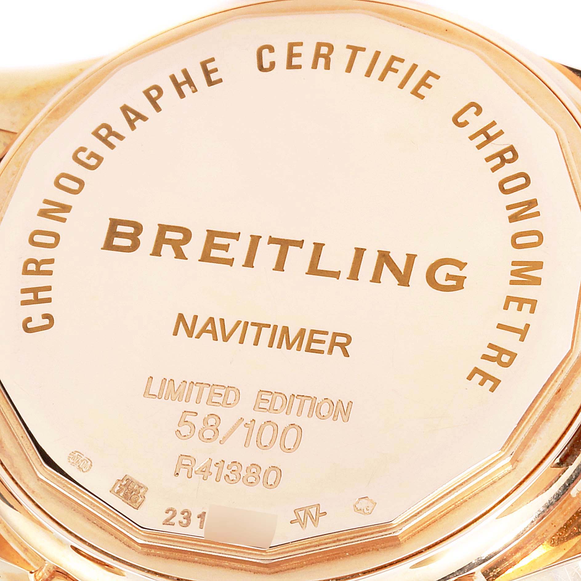 The image shows the engraved back case of a Breitling Navitimer R41380 Men
s Rose Gold Silver Dial R41380 Men
s Rose Gold Silver Dial limited edition watch.