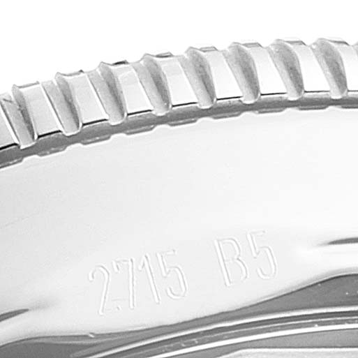 This image shows a close-up of the ridged bezel and engraved side details of the Breitling Superocean A17321 Men
s Stainless Steel Black Dial A17321 Men
s Stainless Steel Black Dial watch.