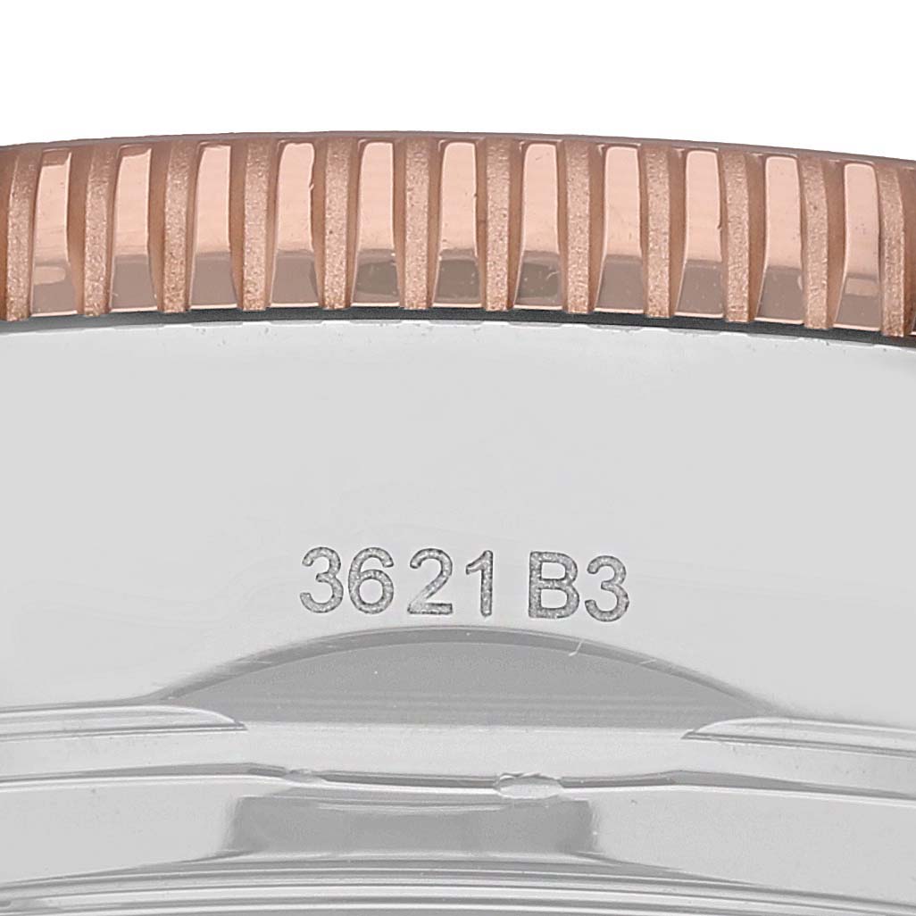 This image shows a close-up of the side of a Breitling Superocean U13313 Men's Stainless Steel Black Dial watch, focusing on the bezel and engraved model number.