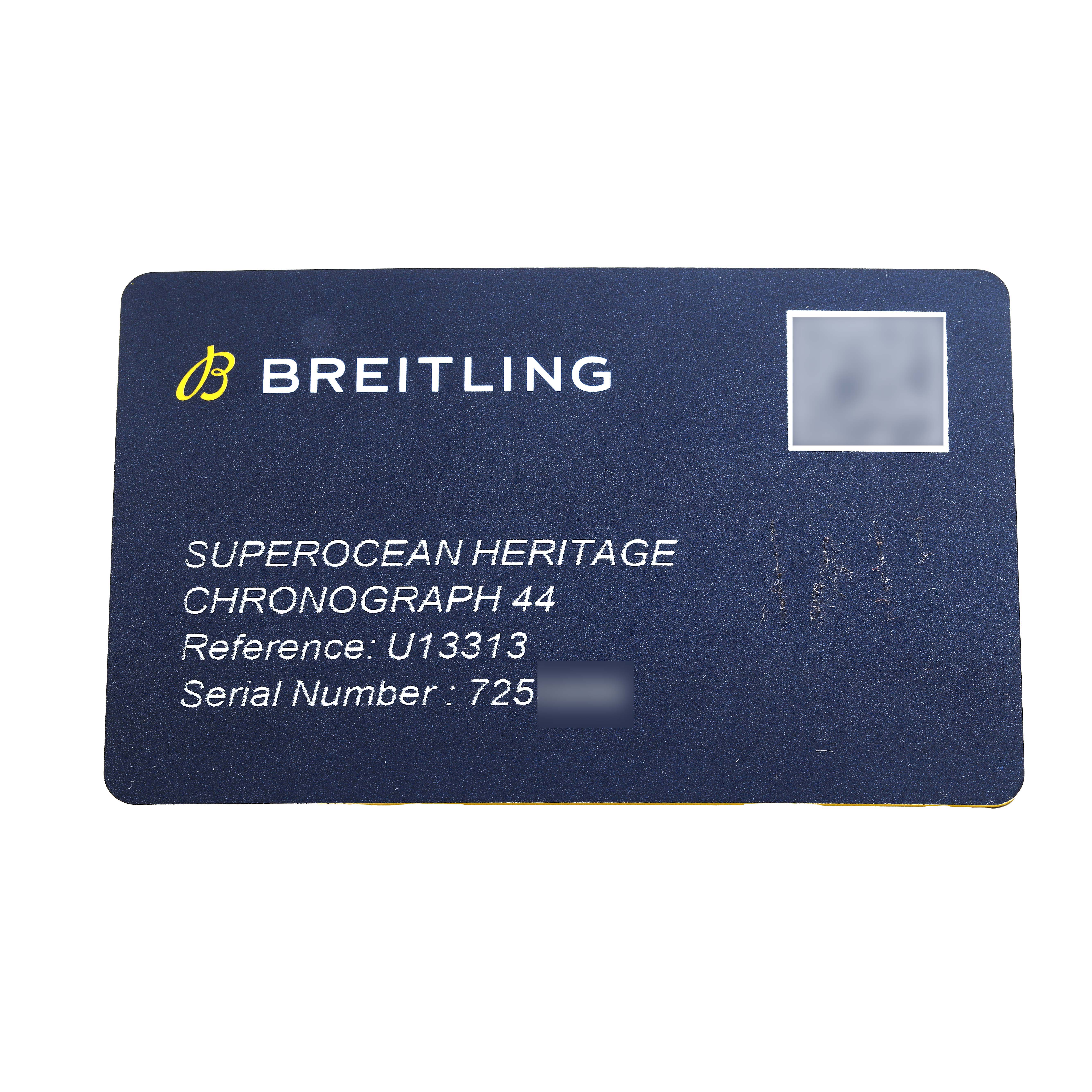 This image shows a warranty card for the Breitling Superocean U13313 Men's Stainless Steel Black Dial Heritage Chronograph 44 model.