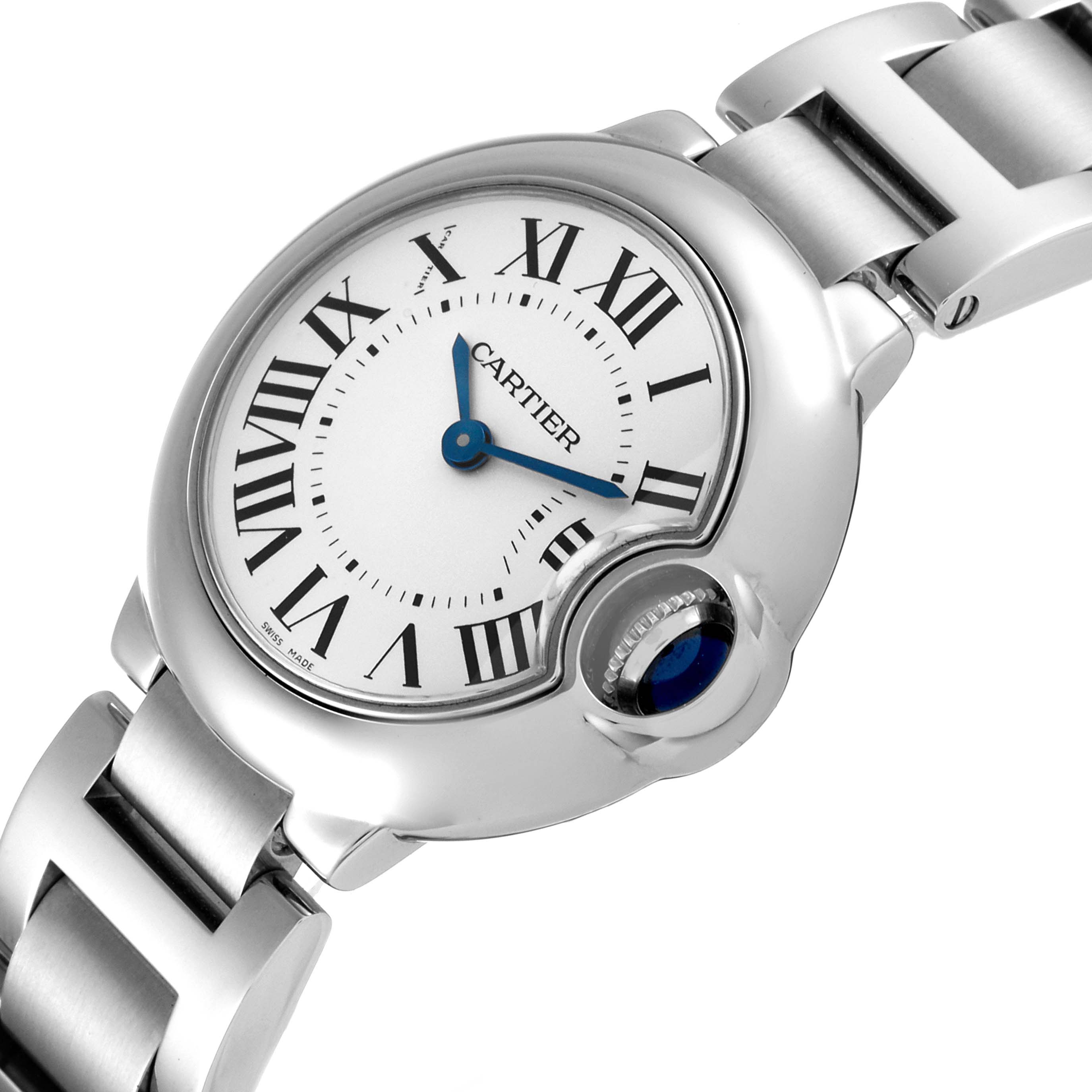 The image shows a close-up of the Cartier Ballon Bleu W69010Z4 Women's Stainless Steel Silver Dial W69010Z4 Women's Stainless Steel Silver Dial watch face and part of its metal strap at a three-quarter angle.