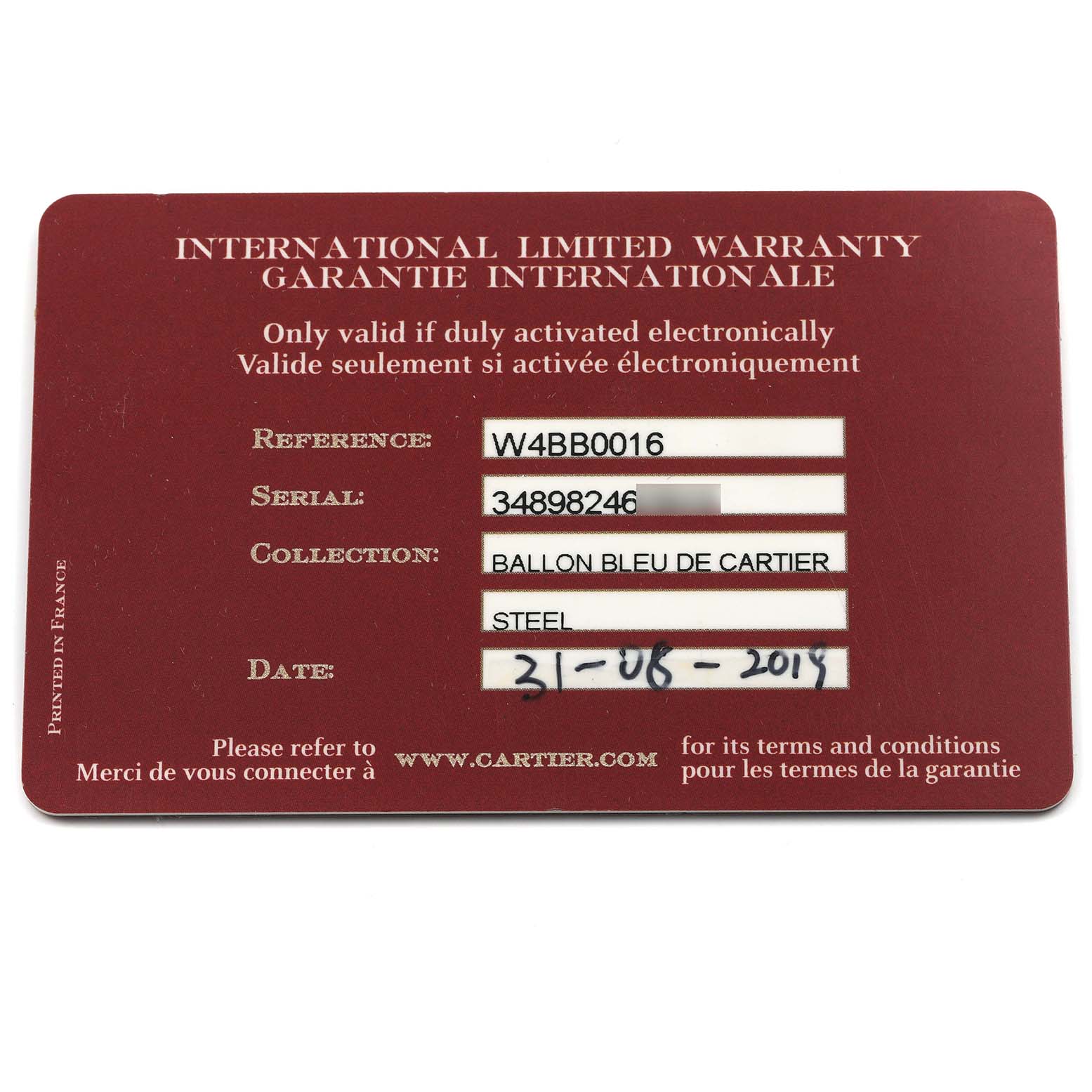 The image shows an international limited warranty card for the Ballon Bleu de Cartier watch.