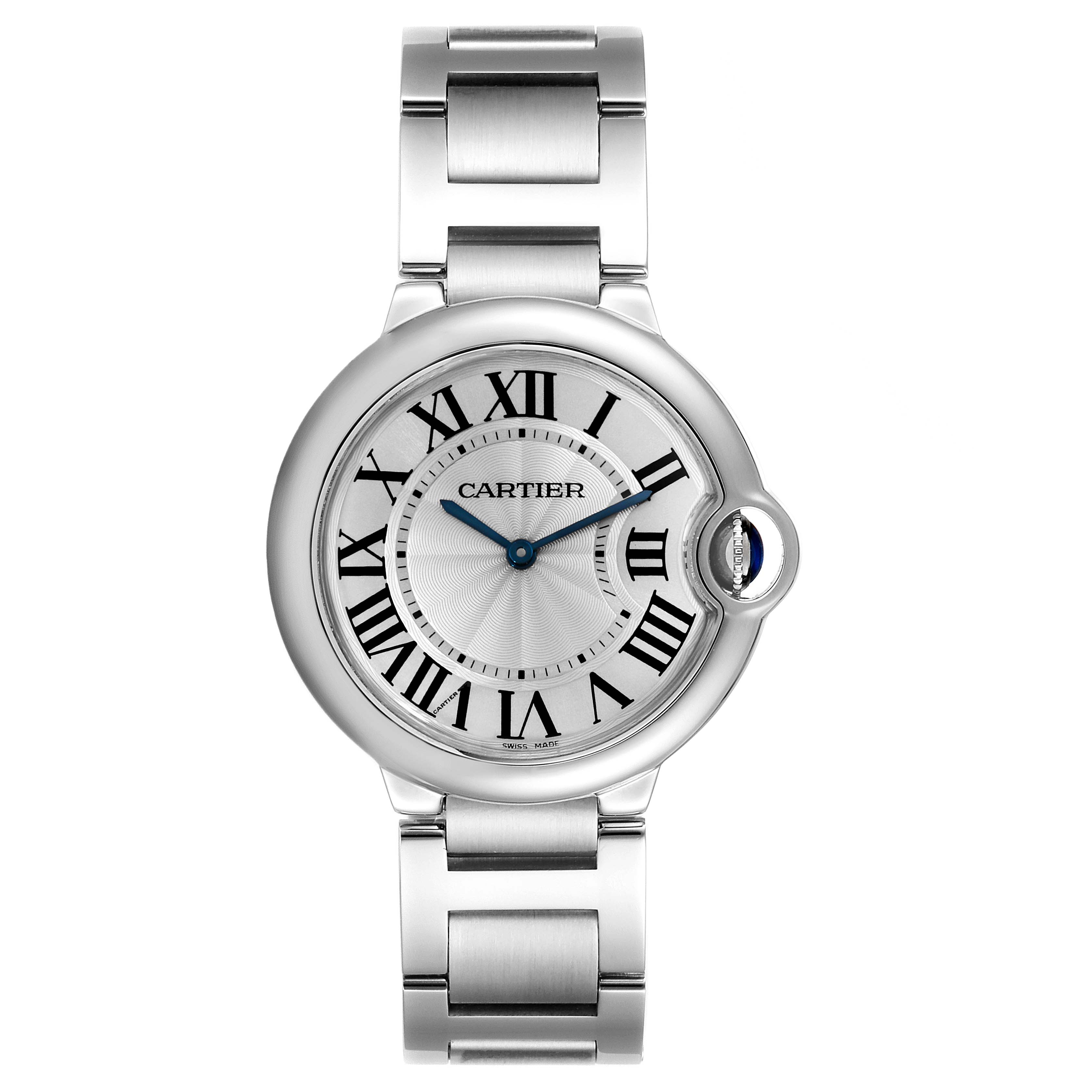 The image shows a front view of the Ballon Bleu de Cartier watch, featuring its dial, Roman numerals, blue hands, and stainless steel bracelet.