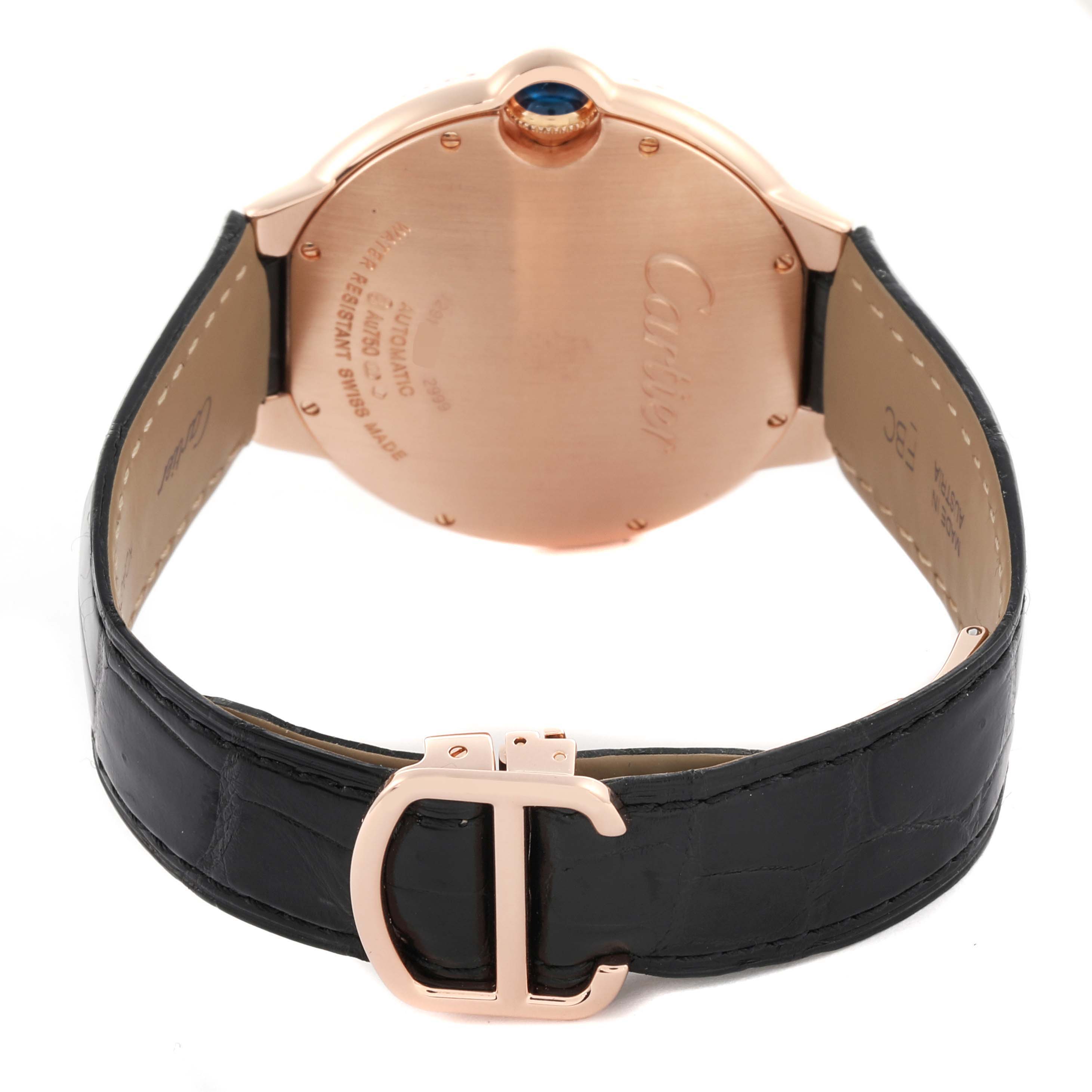The Cartier Ballon Bleu WE900851 Men's Rose Gold Silver Dial WE900851 Men's Rose Gold Silver Dial watch is shown from the back, emphasizing the case back and leather strap with the clasp.
