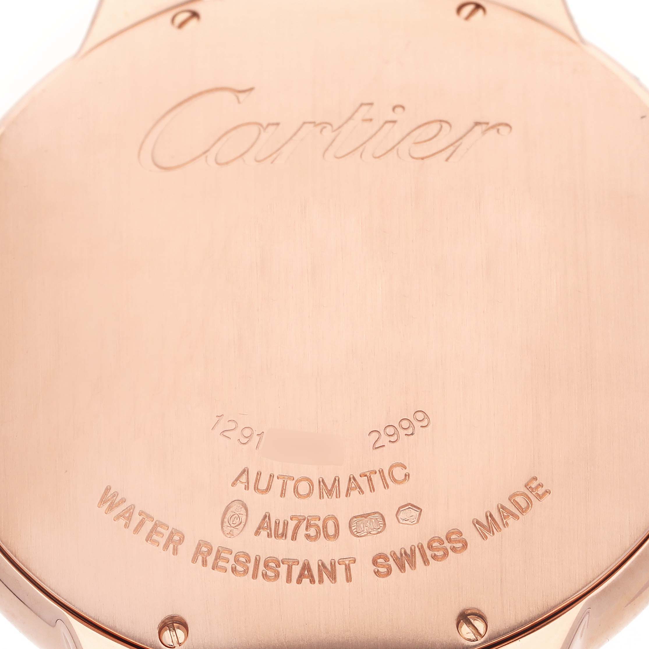 The image shows the back case of a Cartier Ballon Bleu WE900851 Men's Rose Gold Silver Dial WE900851 Men's Rose Gold Silver Dial watch, highlighting engravings and markings.