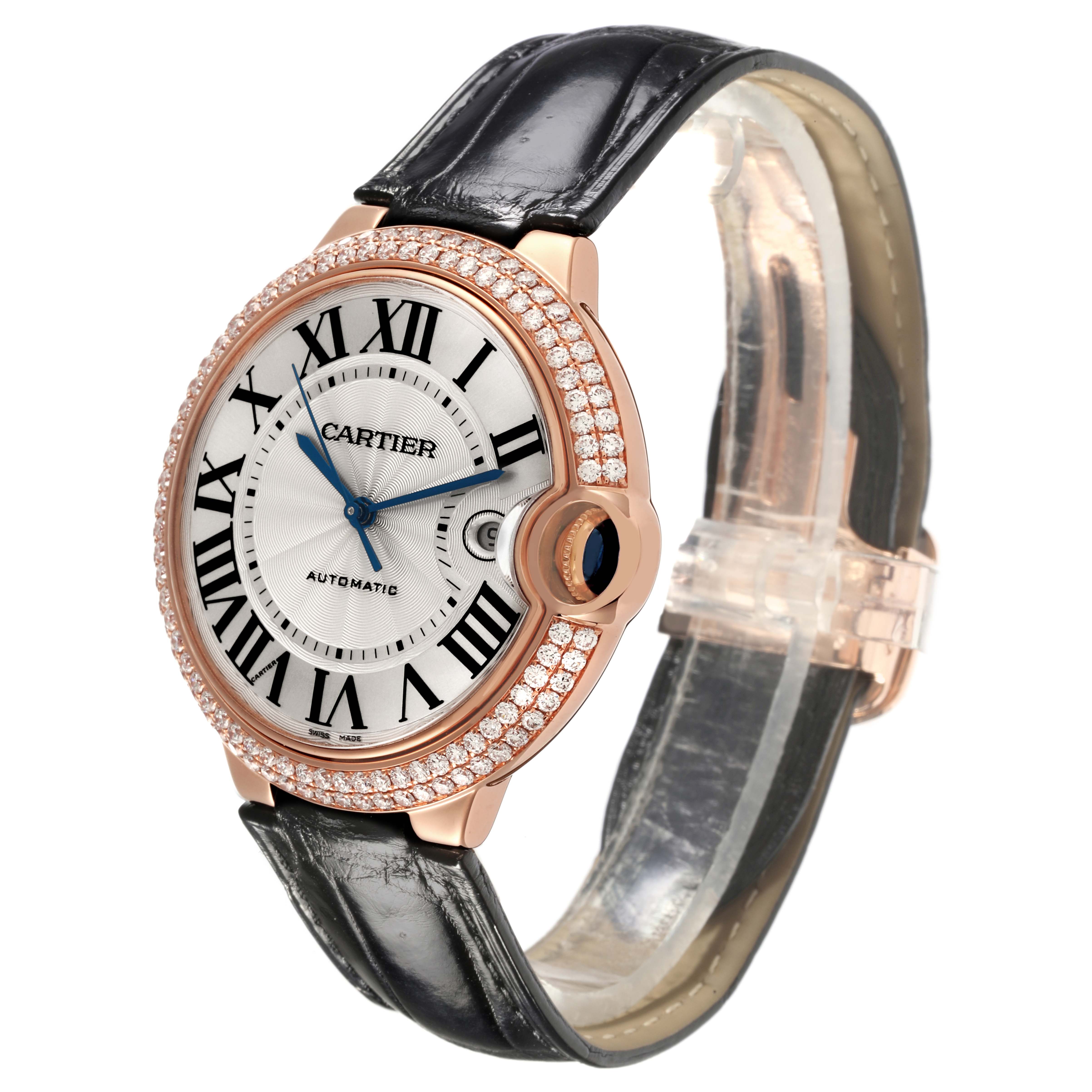 The Cartier Ballon Bleu WE900851 Men's Rose Gold Silver Dial WE900851 Men's Rose Gold Silver Dial watch is shown at a three-quarter angle, showcasing the dial, diamond bezel, and leather strap.