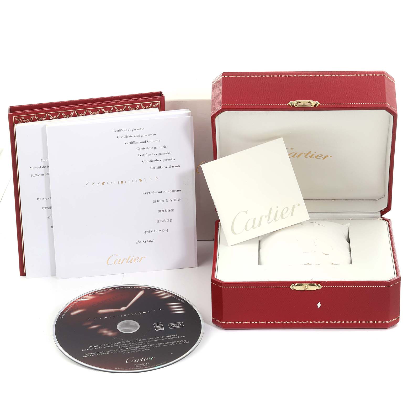 The image shows the Cartier Ballon Bleu W69010Z4 Women
s Stainless Steel Silver Dial W69010Z4 Women
s Stainless Steel Silver Dial watch packaging, including the box, manuals, and a DVD, all from a front angle.