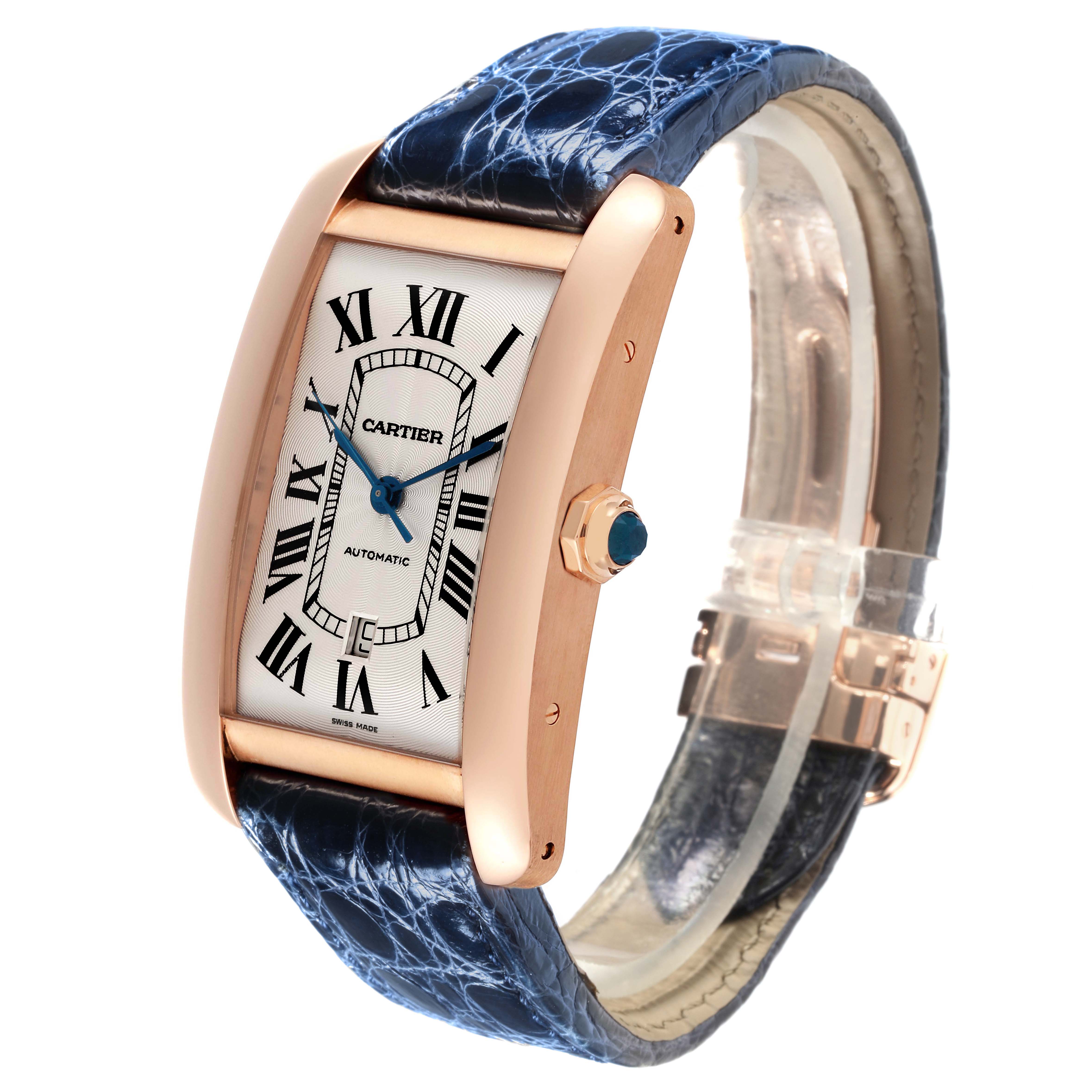The Cartier Tank Américaine is shown at a 3/4 angle, highlighting its rectangular dial, blue leather strap, and rose gold case.