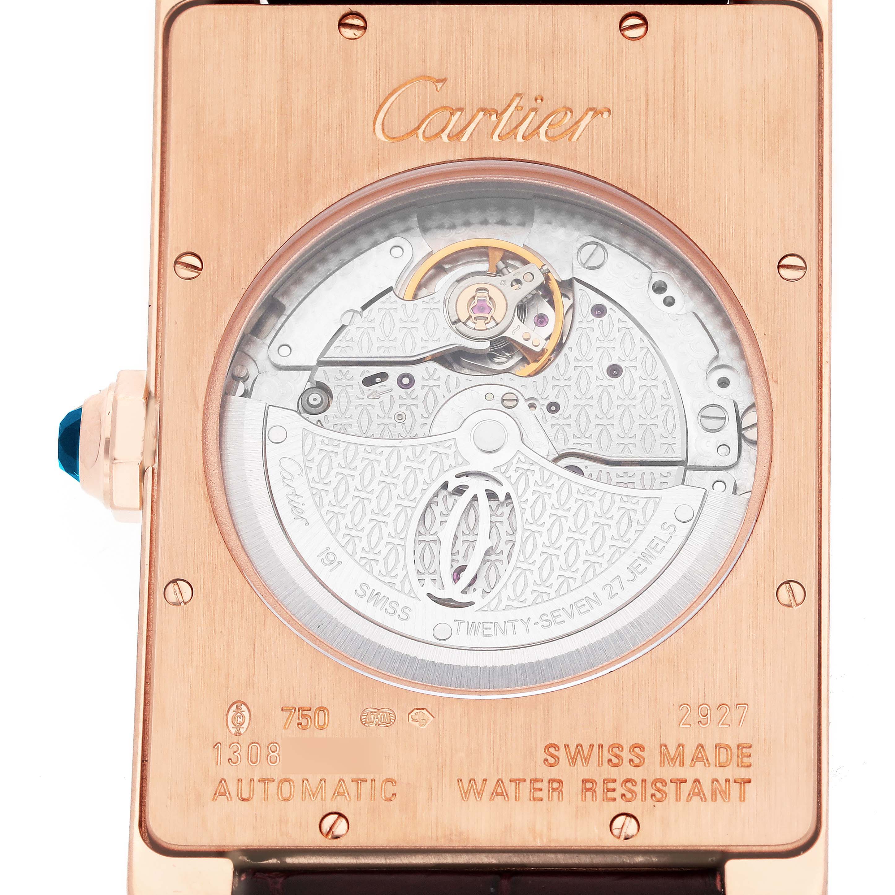 The image shows the back of a Cartier Tank Americaine W2609856 Men's Rose Gold Silver Dial W2609856 Men's Rose Gold Silver Dial watch, revealing its automatic movement details.