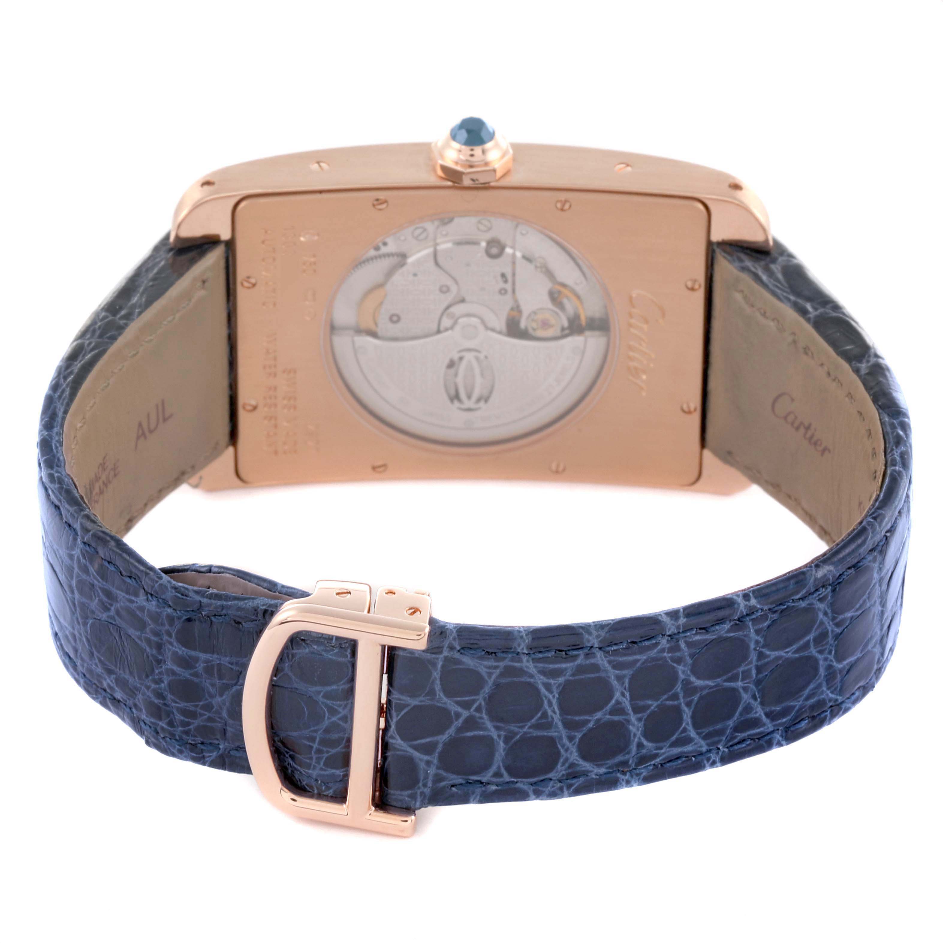 The Cartier Tank Americaine W2609856 Men's Rose Gold Silver Dial W2609856 Men's Rose Gold Silver Dial watch is shown from the back with its movement, caseback details, and blue leather strap.