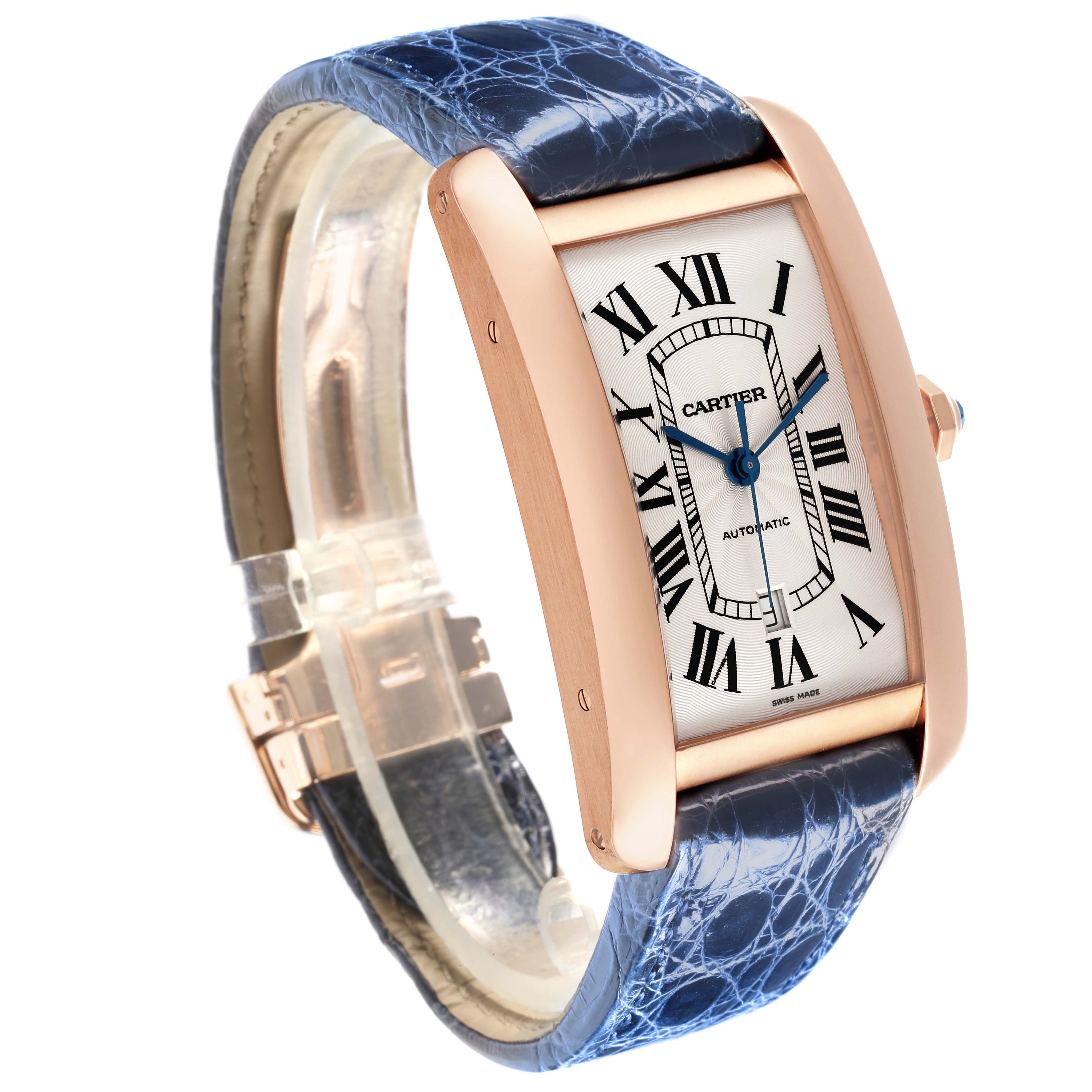 The Cartier Tank Americaine W2609856 Men's Rose Gold Silver Dial W2609856 Men's Rose Gold Silver Dial watch is shown at an angled view, displaying its face, rose gold case, and blue leather strap.