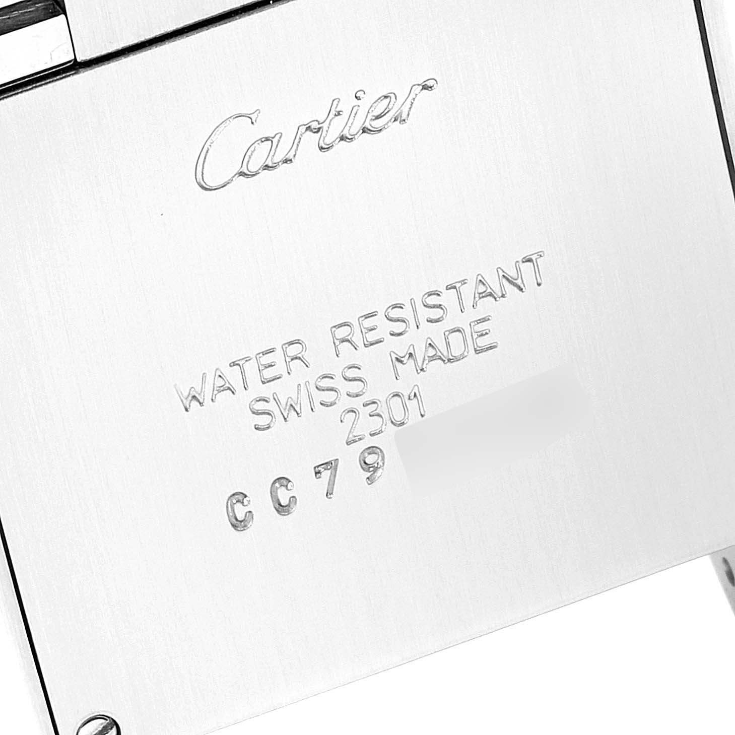 This image shows the back case of a Tank Francaise watch by Cartier, highlighting the brand
s engraving and water resistance details.