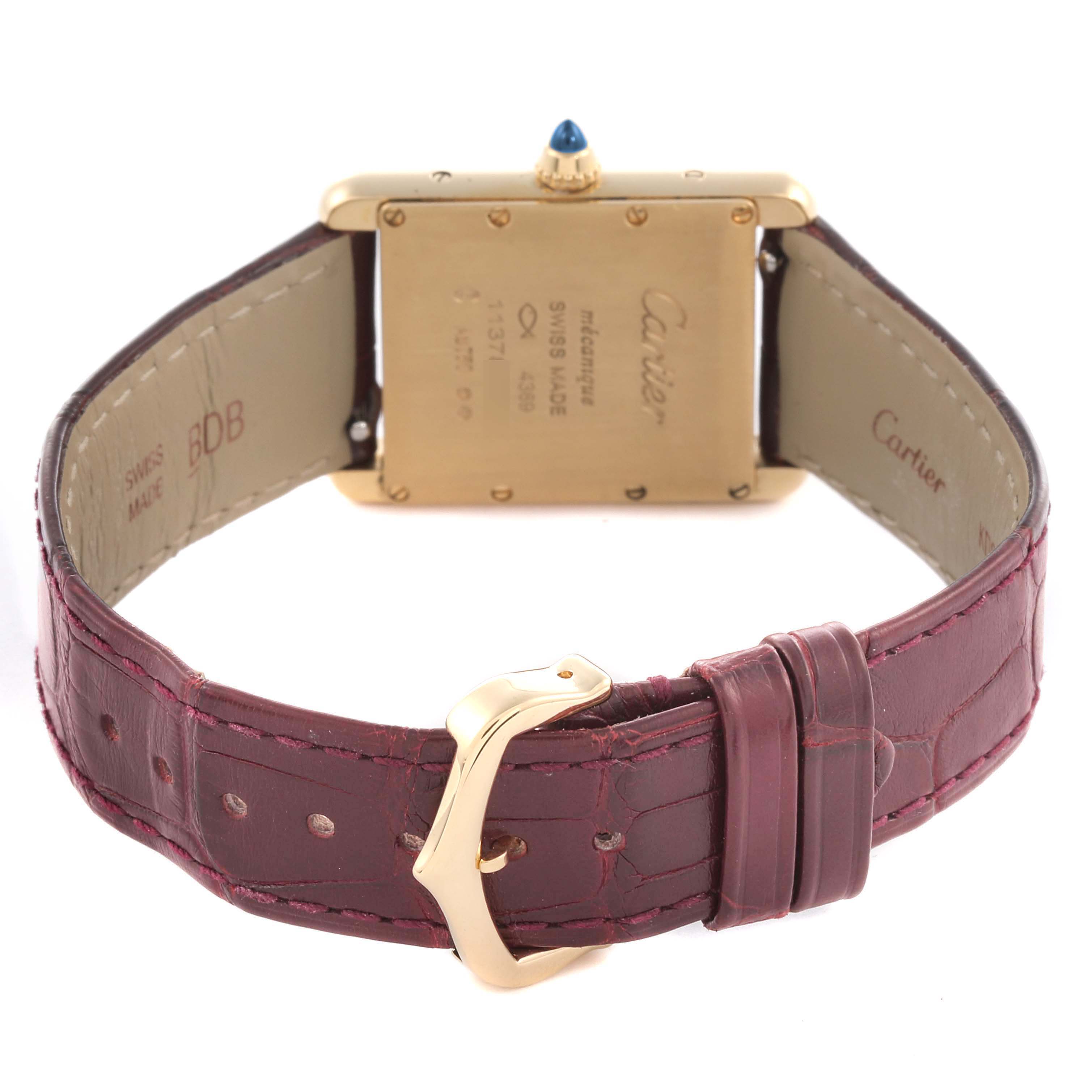 The Cartier Tank Louis WGTA0190 Men's Yellow Gold Burgundy Dial WGTA0190 Men's Yellow Gold Burgundy Dial watch is shown from the back, highlighting its case, strap, and buckle.
