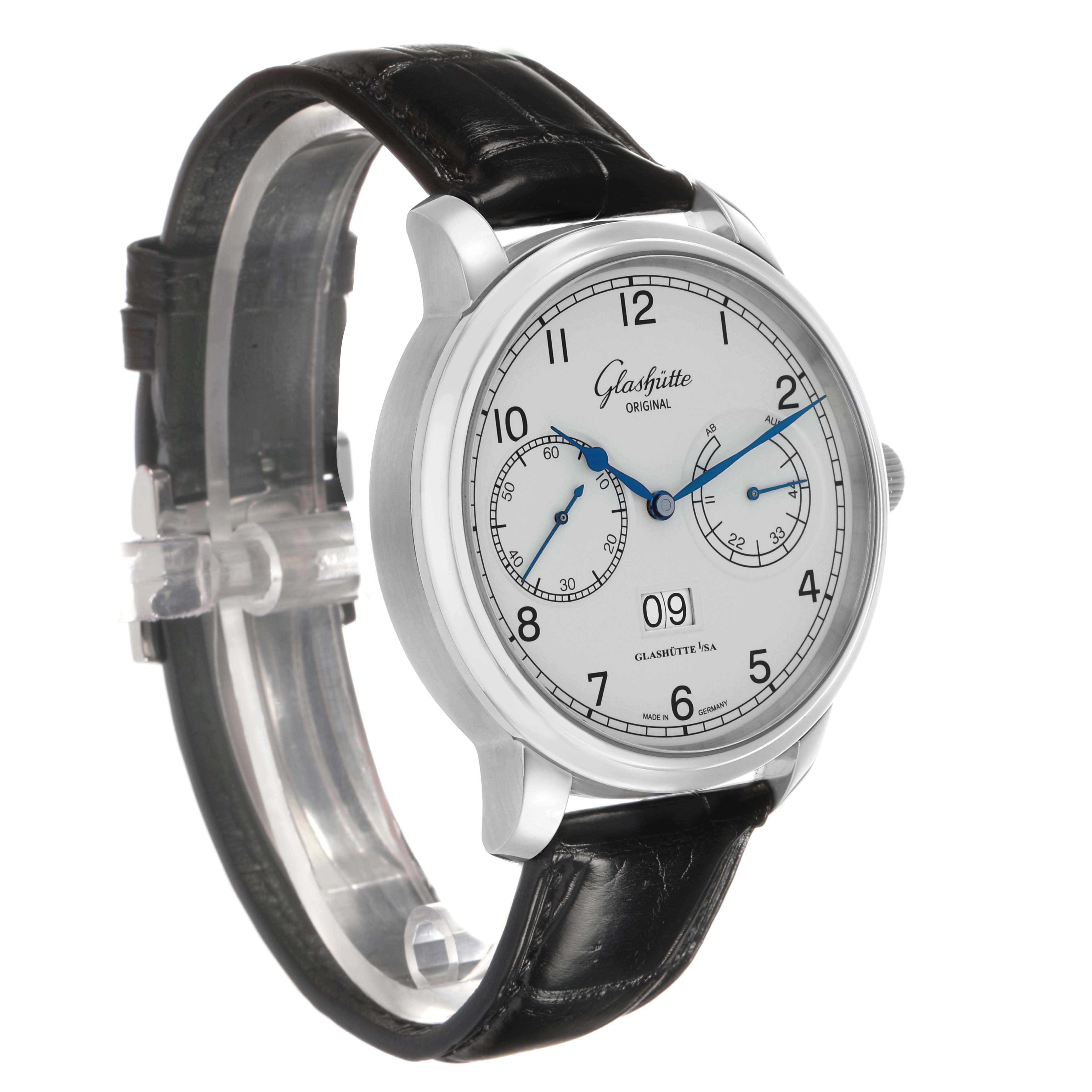 The image shows a Glashütte Senator watch at a three-quarter angle, highlighting its dial and leather strap.