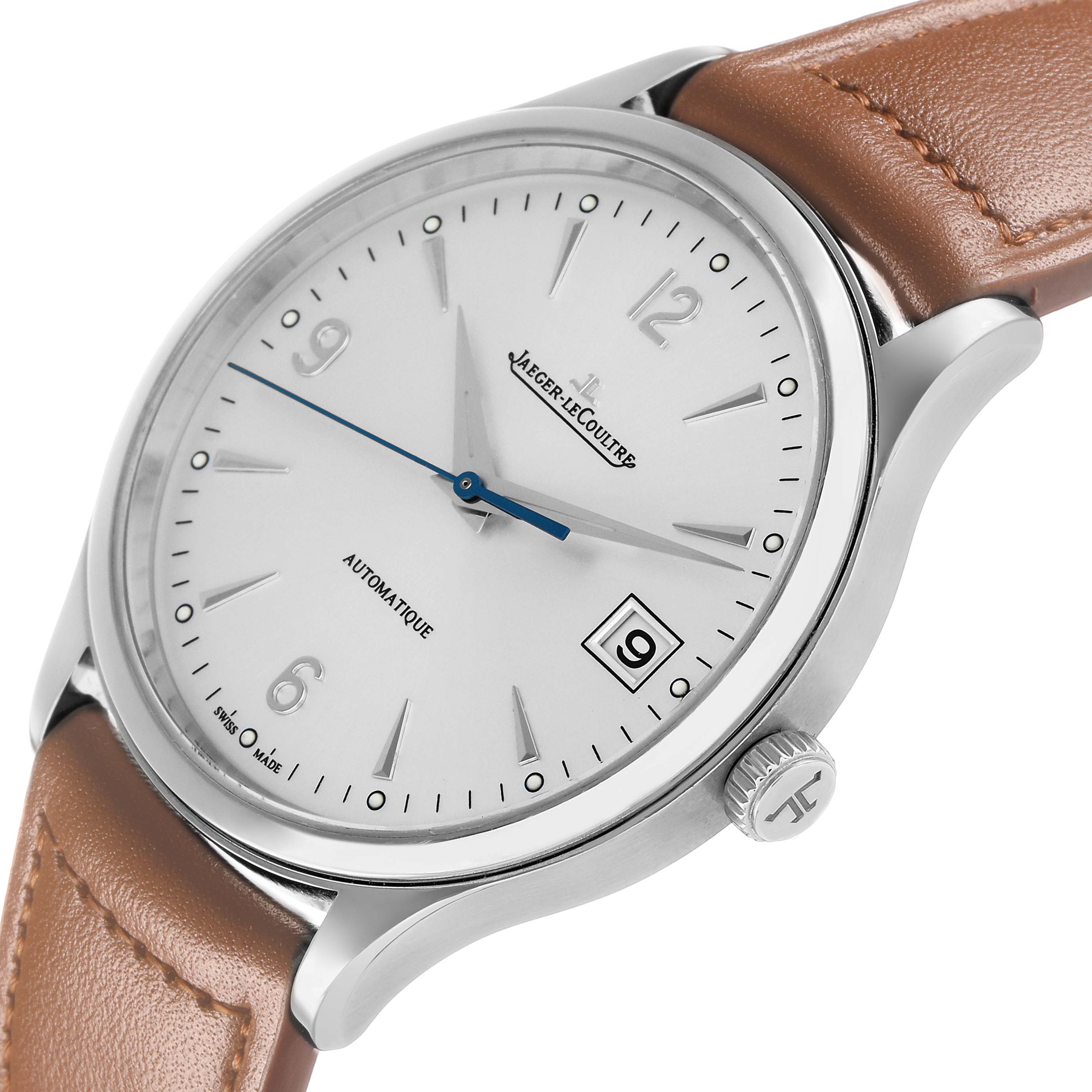 The Jaeger-LeCoultre Master watch is shown at an angled close-up, highlighting the dial, crown, hands, and leather strap.