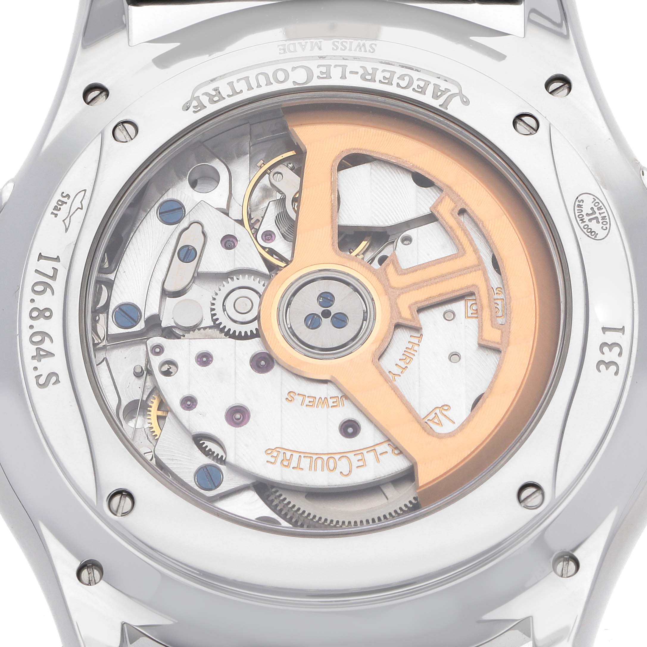 The image shows the back of a Jaeger-LeCoultre Master watch, revealing the movement and rotor.