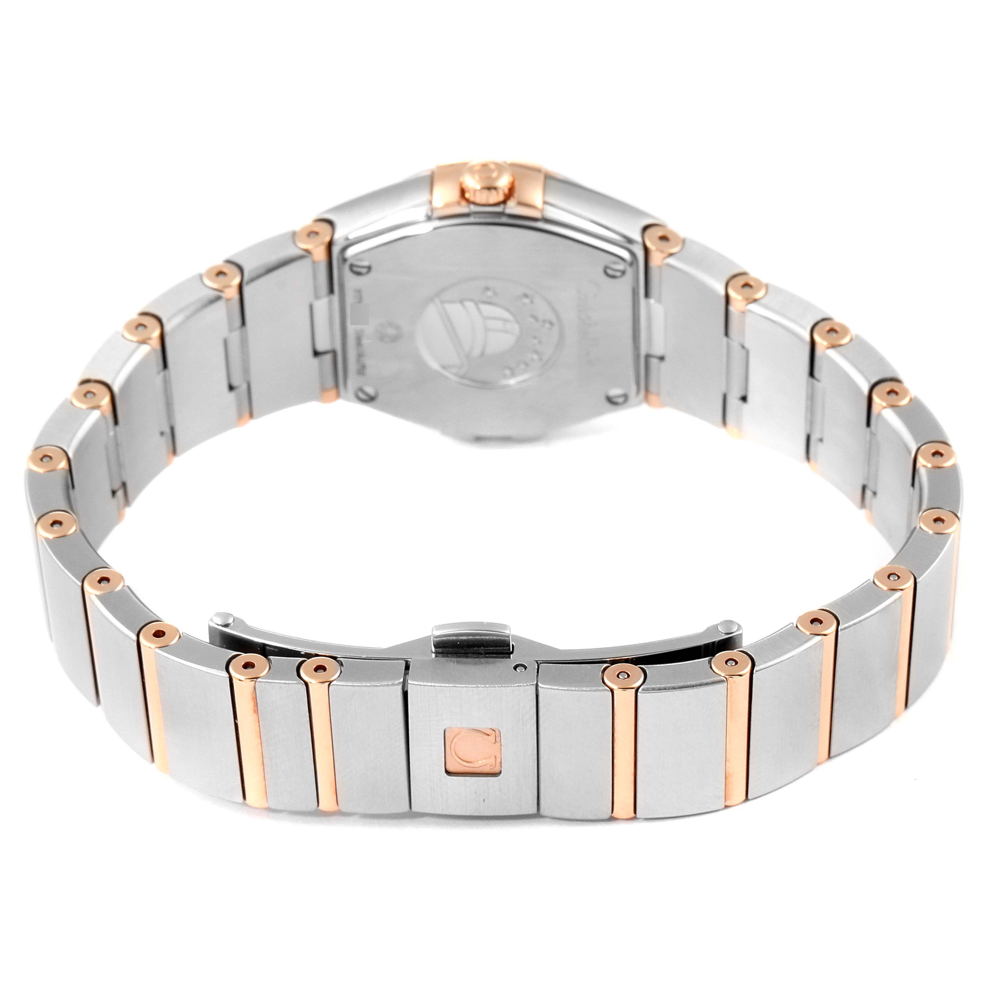 The image shows the back view of an Omega 123.20.24.60.05.001 Women
s Steel and Gold (two tone) Mother of Pearl Dial 123.20.24.60.05.001 Women
s Steel and Gold (two tone) Mother of Pearl Dial Constellation MOP Steel Rose Gold Ladies Watch model 123.20.24.60.05.001.