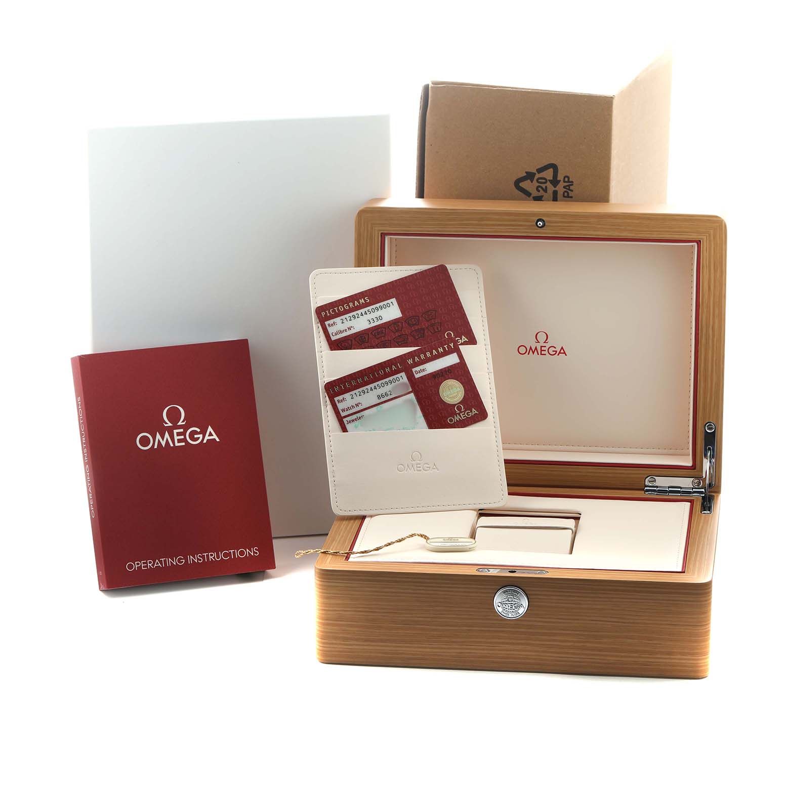 The image shows the Omega Seamaster 212.92.44.50.99.001 Men's Titanium Grey Dial packaging, including a wooden box, operating instructions, and warranty cards.