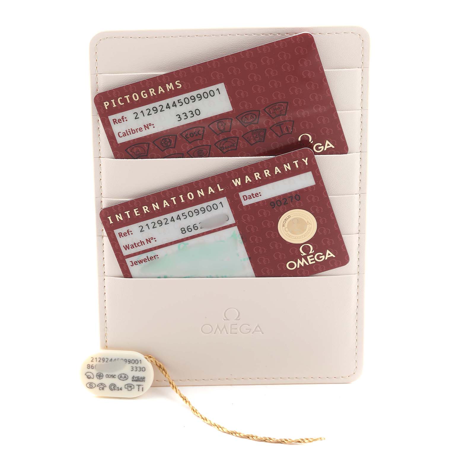 The image shows Omega Seamaster 212.92.44.50.99.001 Men's Titanium Grey Dial accessories with Pictogram and International Warranty cards in a holder, and a tag with details.