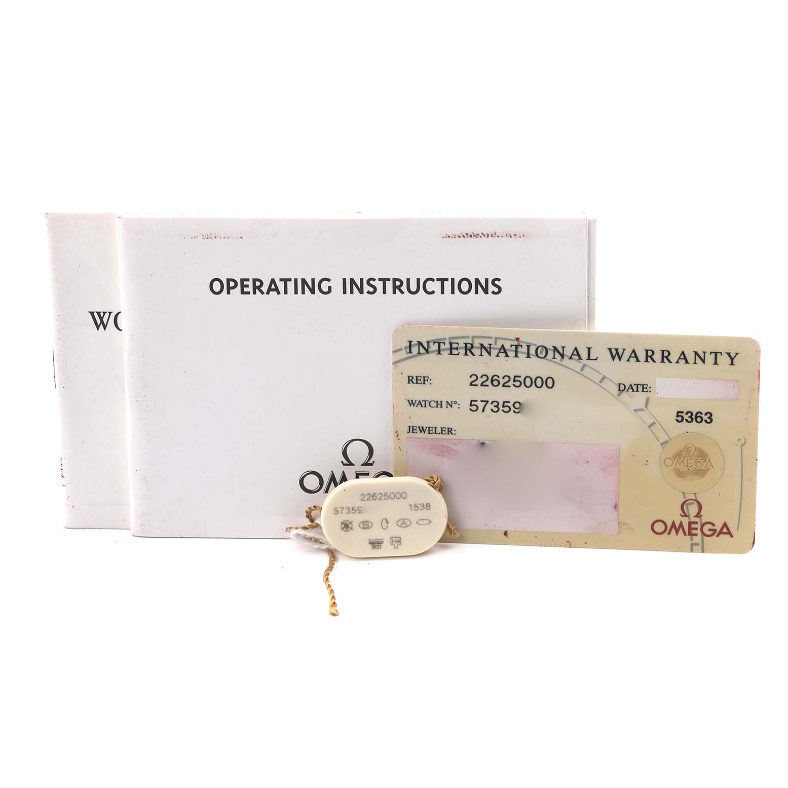 The image shows an Omega Seamaster 2262.50.00 Men
s Stainless Steel Black Dial 2262.50.00 Men
s Stainless Steel Black Dial
s operating instructions, warranty card, and product tags.